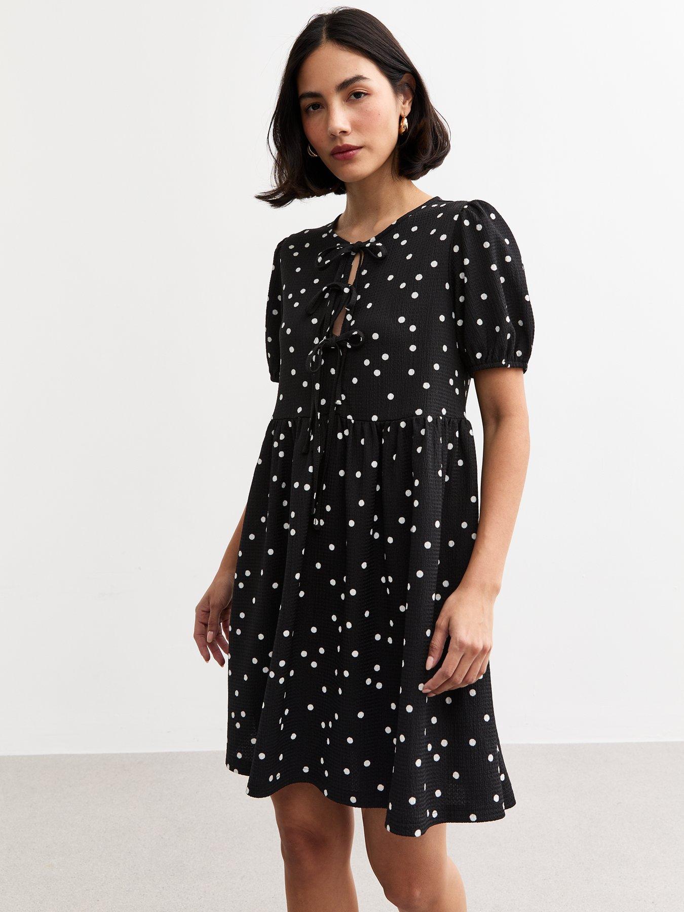  image of new-look-black-crinkled-texture-polka-dot-tie-front-mini-dress