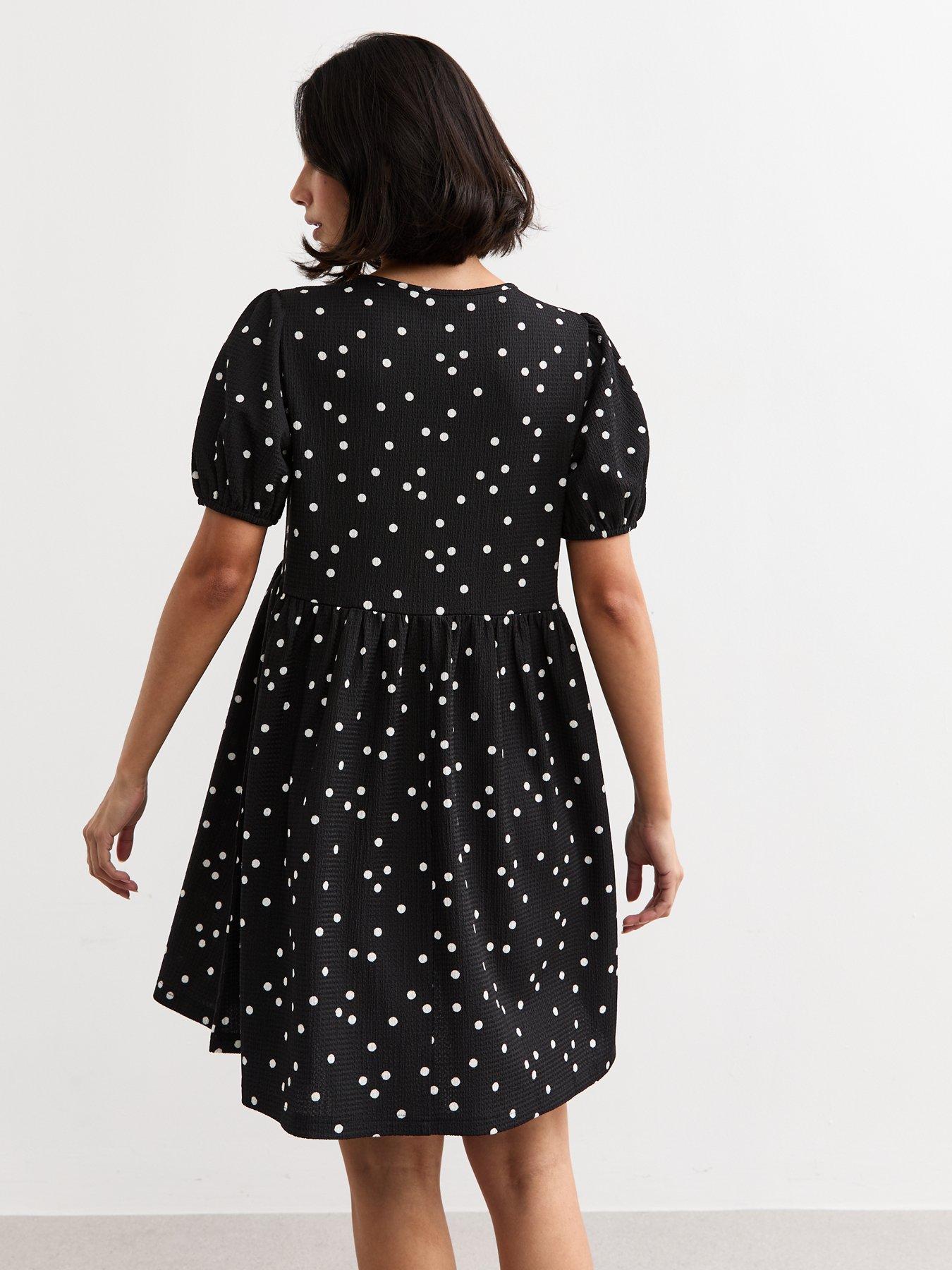  image of new-look-black-crinkled-texture-polka-dot-tie-front-mini-dress