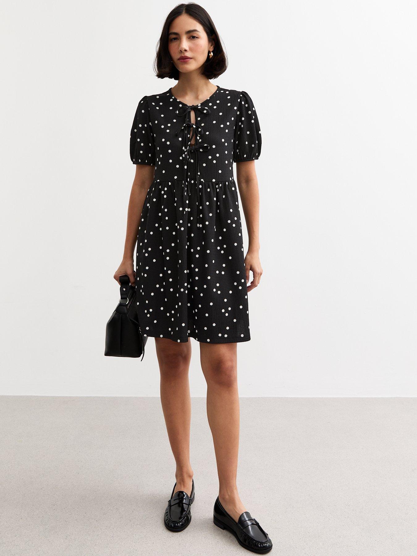  image of new-look-black-crinkled-texture-polka-dot-tie-front-mini-dress