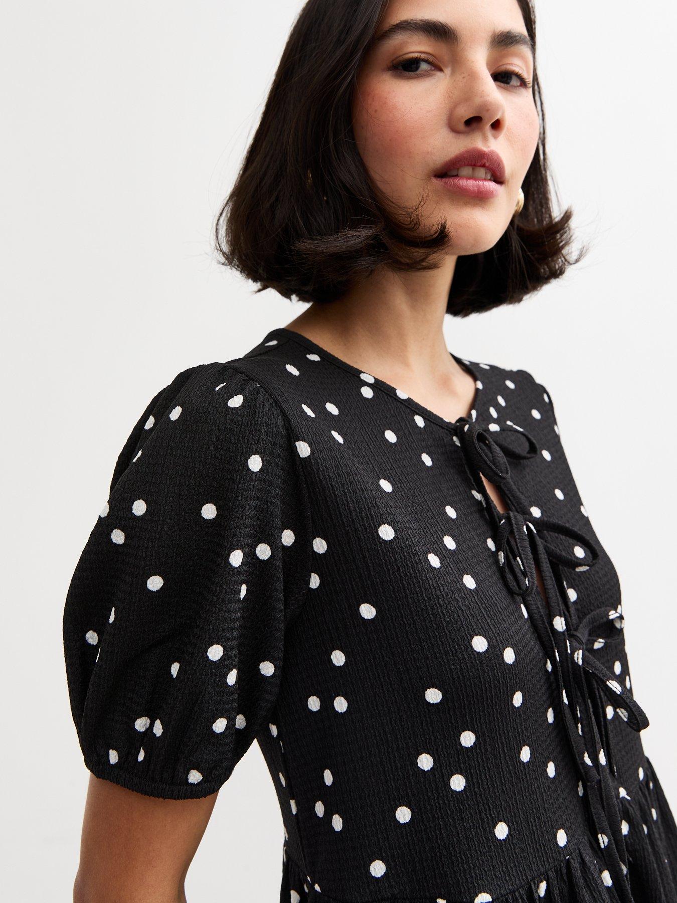  image of new-look-black-crinkled-texture-polka-dot-tie-front-mini-dress