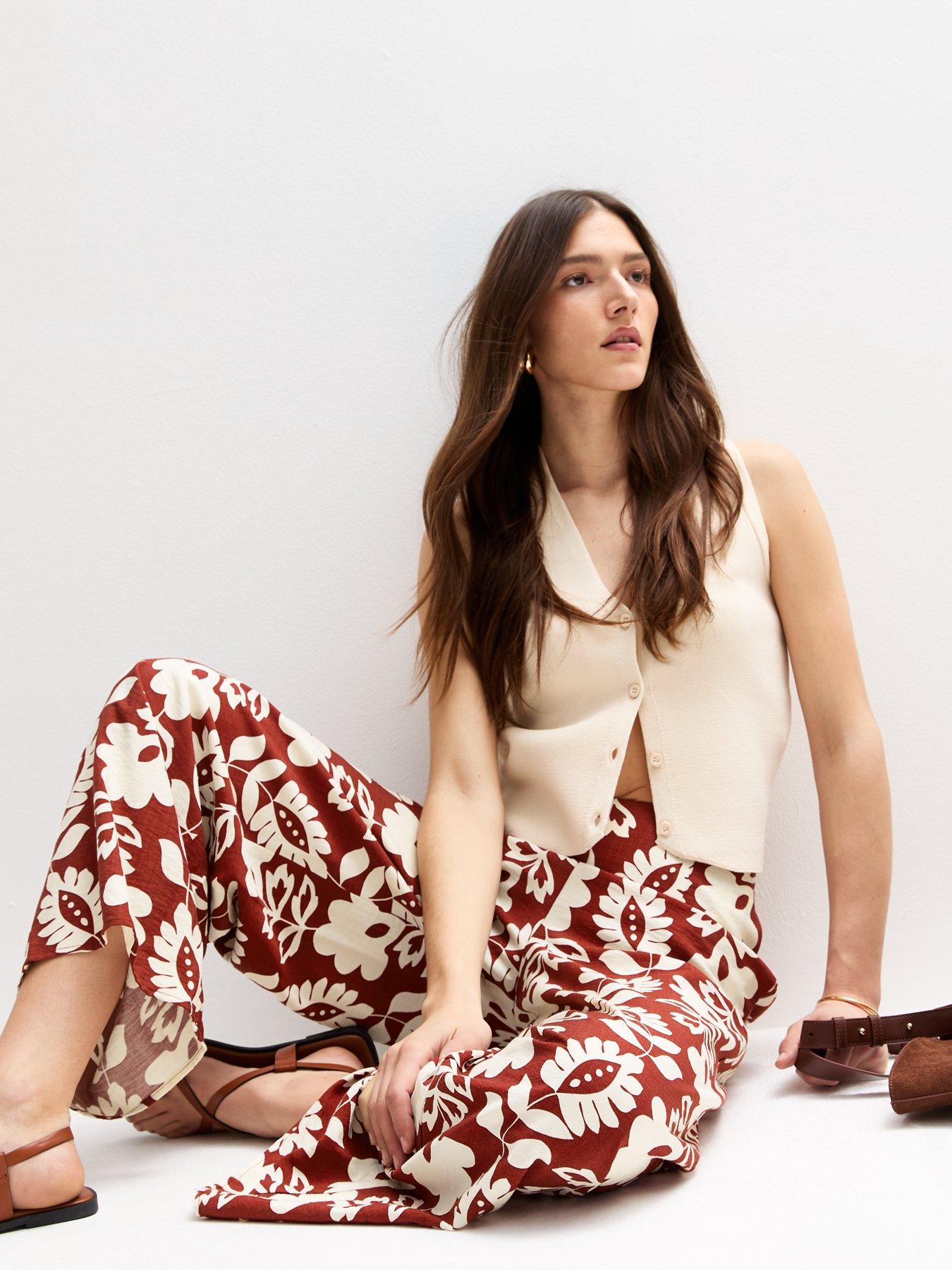  image of new-look-brown-floral-print-wide-leg-trousers