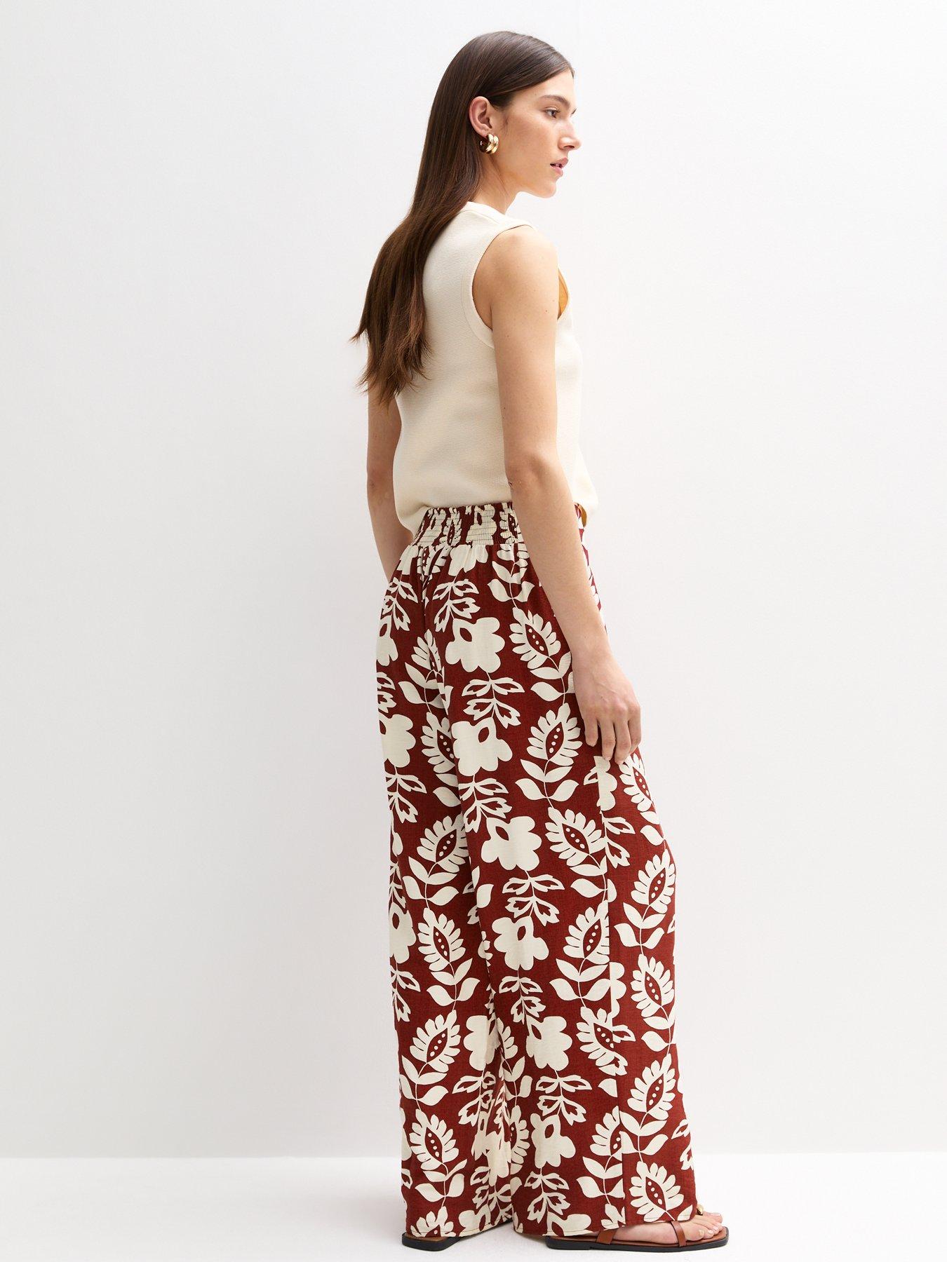  image of new-look-brown-floral-print-wide-leg-trousers