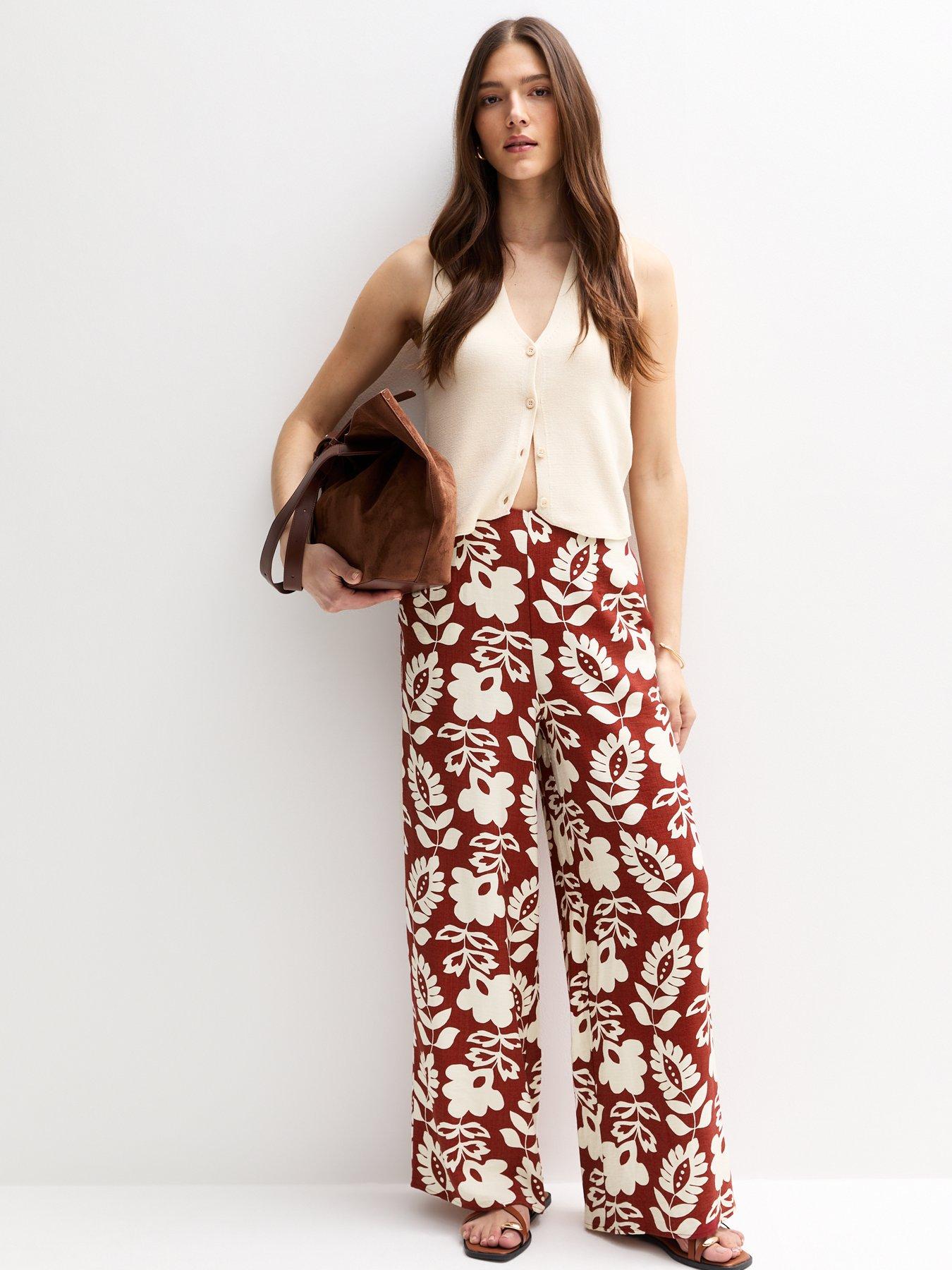  image of new-look-brown-floral-print-wide-leg-trousers
