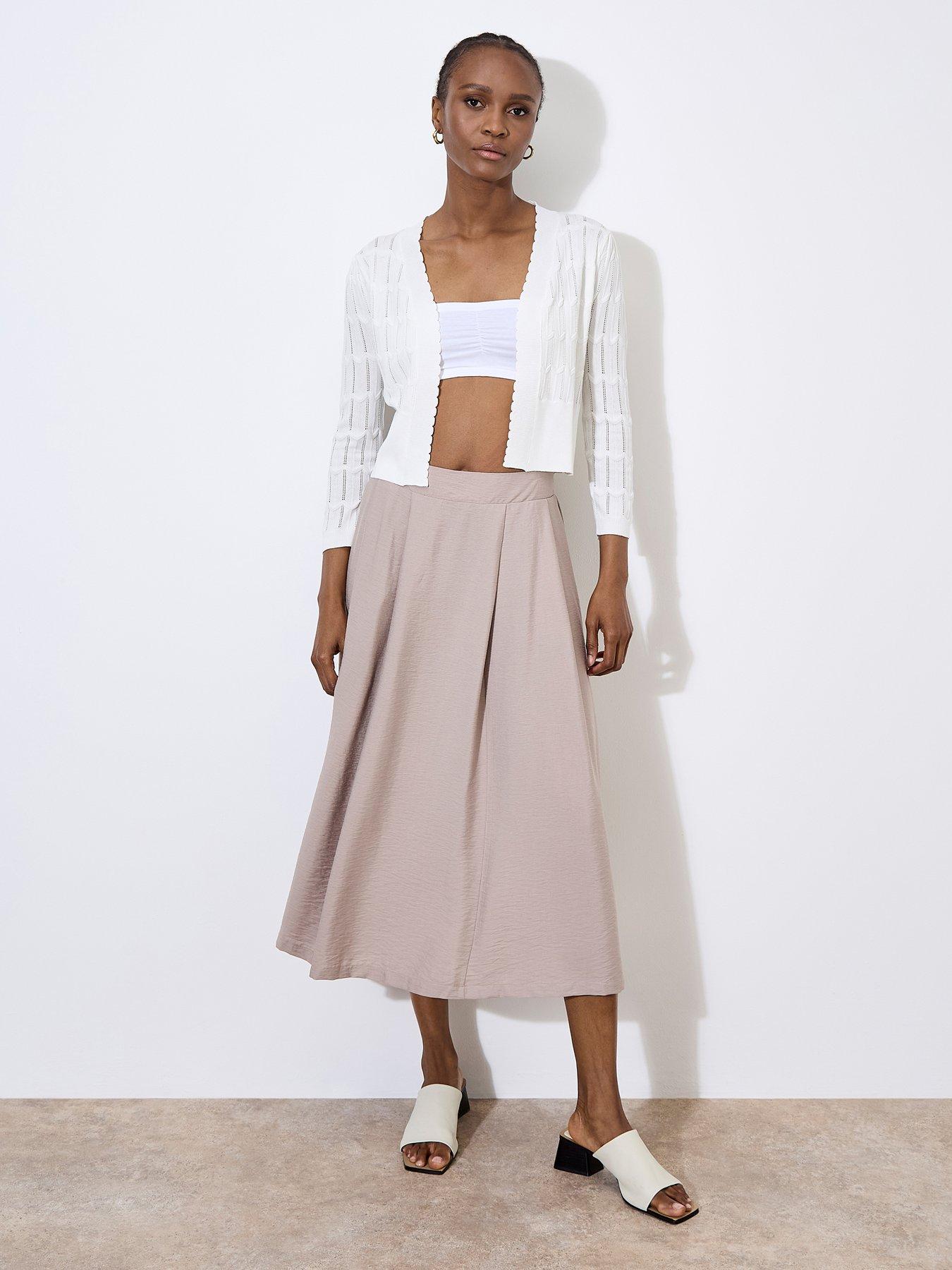  image of apricot-pointelle-chevron-shrug-cream