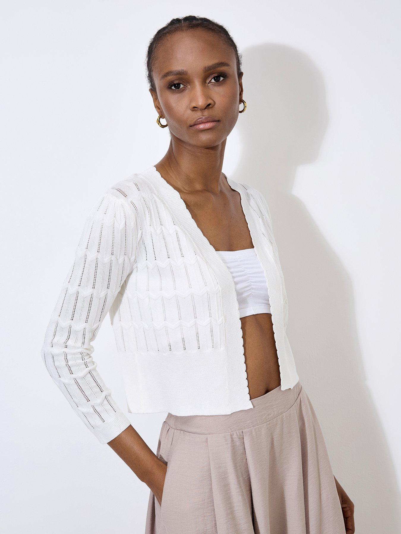  image of apricot-pointelle-chevron-shrug-cream