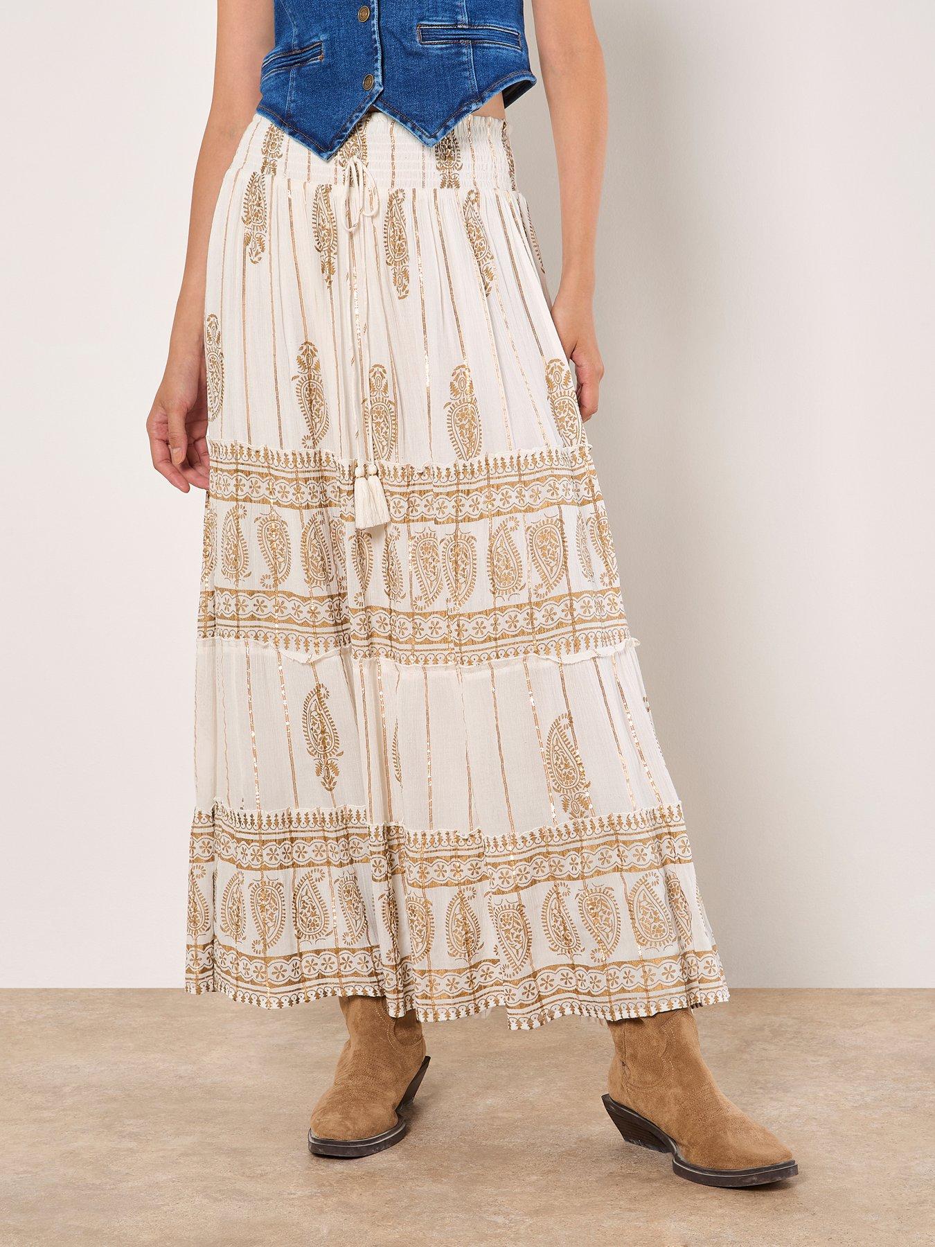 apricot-gold-print-tassel-maxi-skirt-cream
