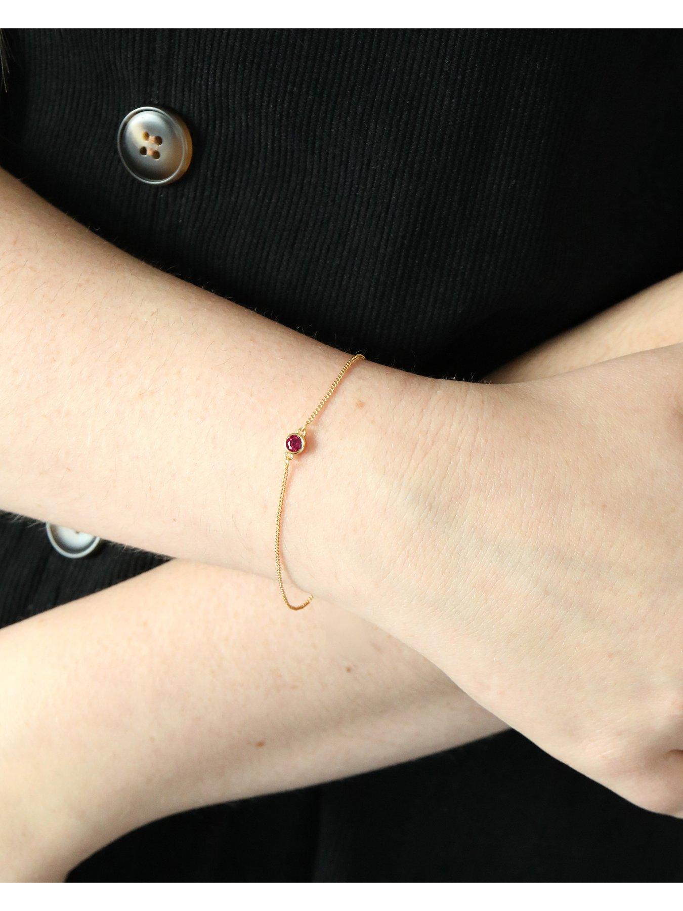  image of the-love-collection-gold-plated-sterling-silver-birthstone-cz-rubover-bracelet