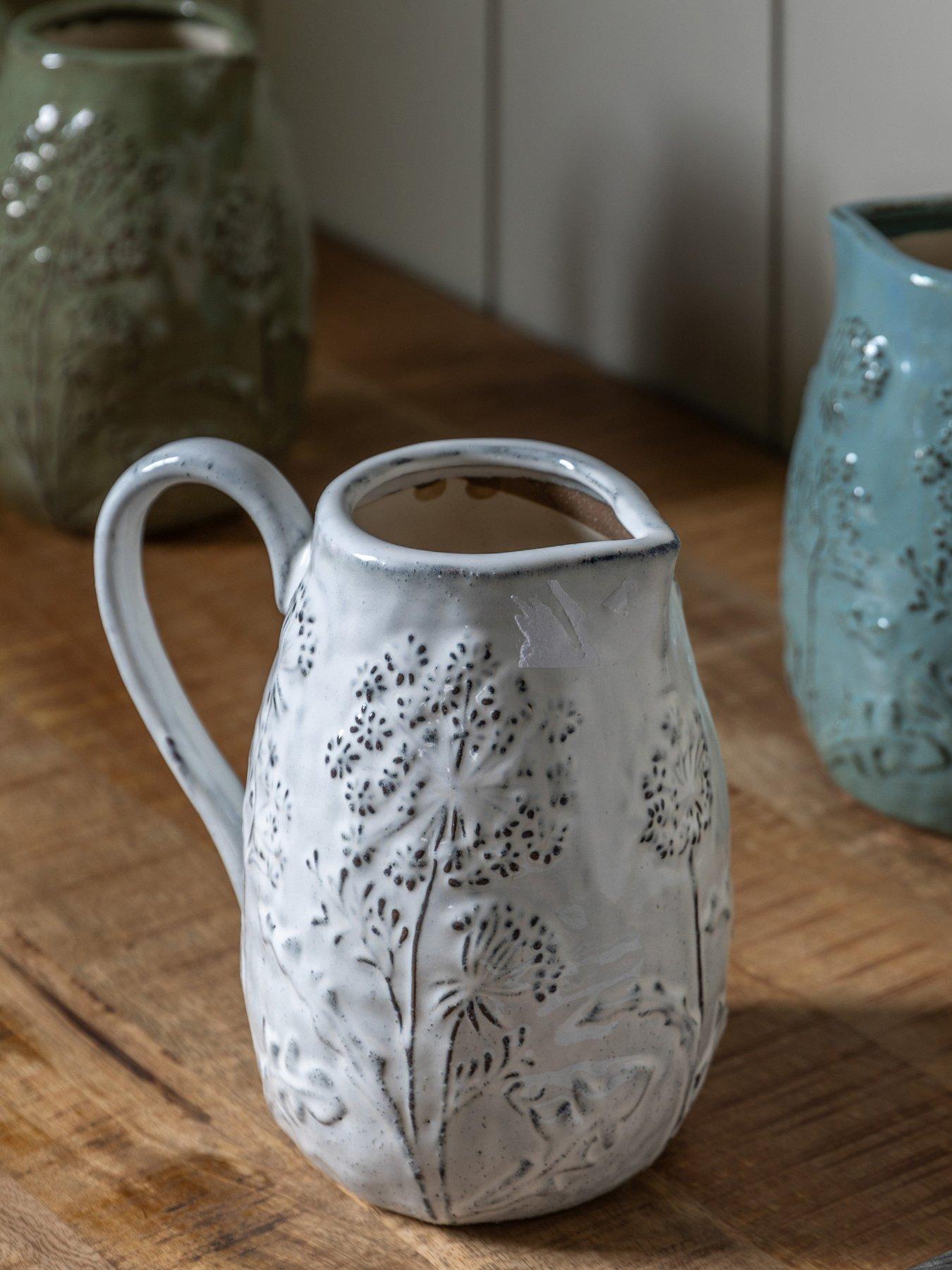 front image of gallery-meadow-embossed-ceramic-jug-stone