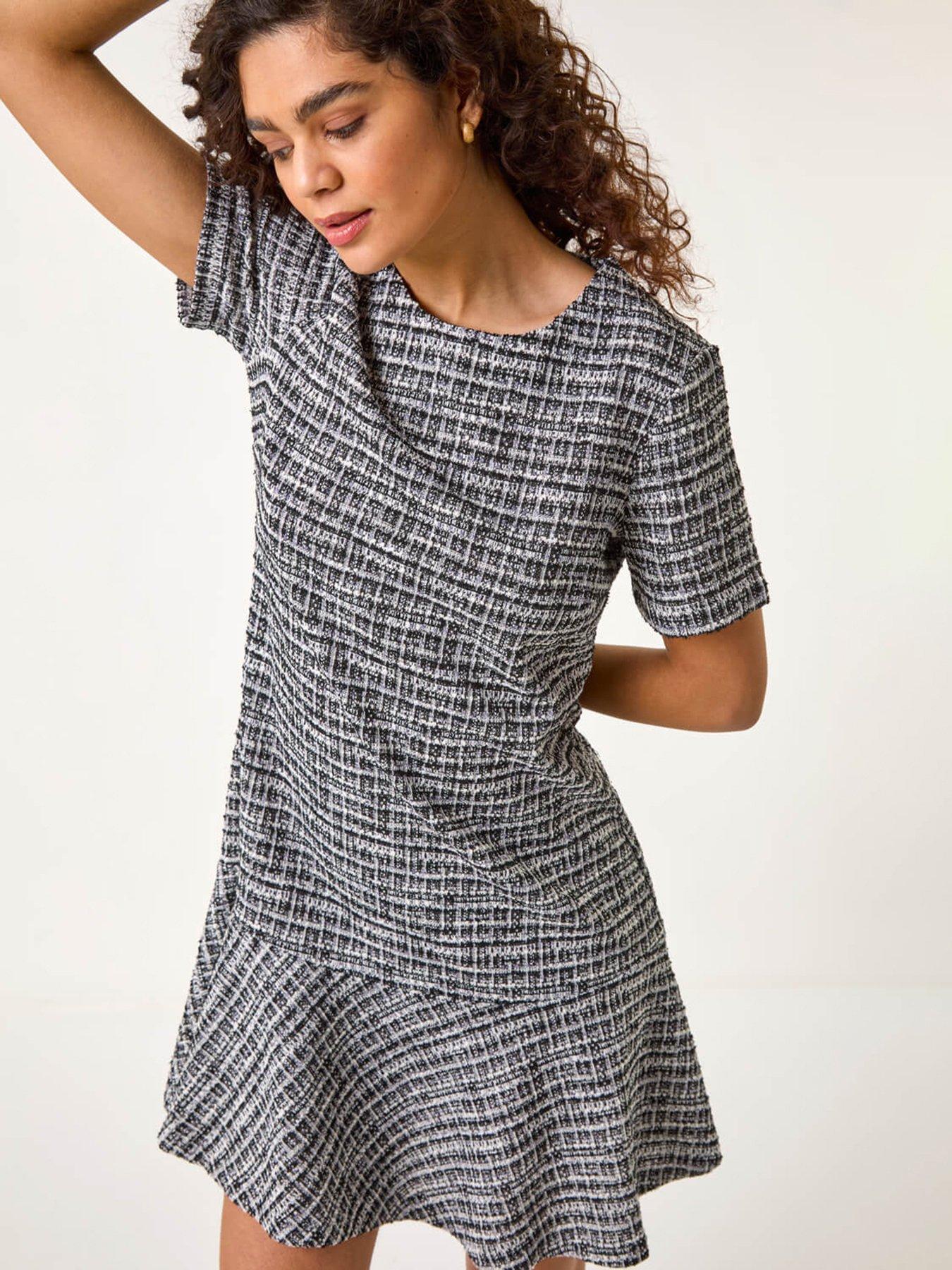 Image 1 of 5 of Roman Textured Frill Hem Stretch Dress - Black