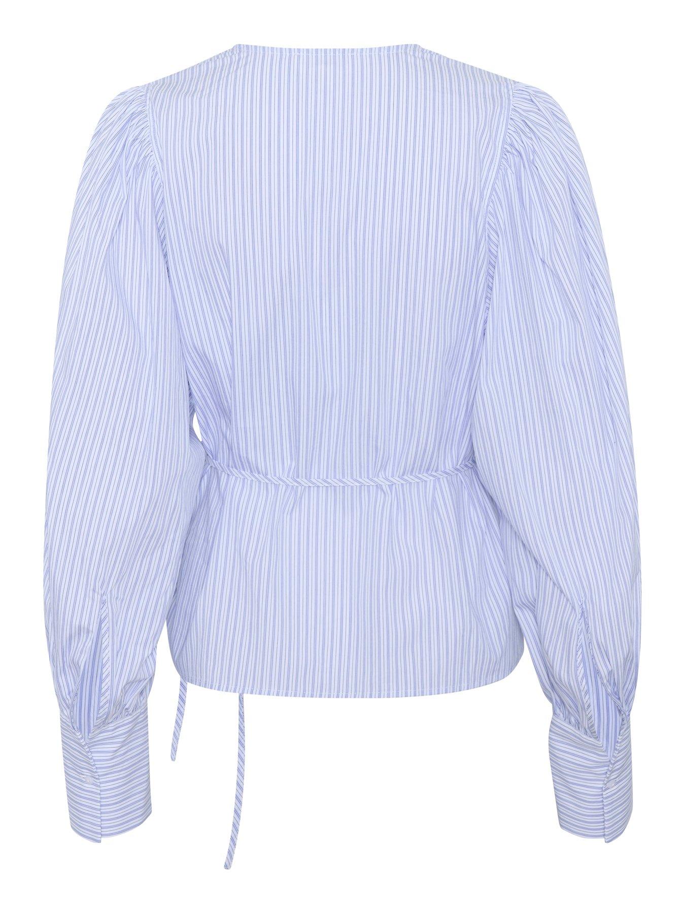  image of soaked-in-luxury-oriana-wrap-blouse-blue