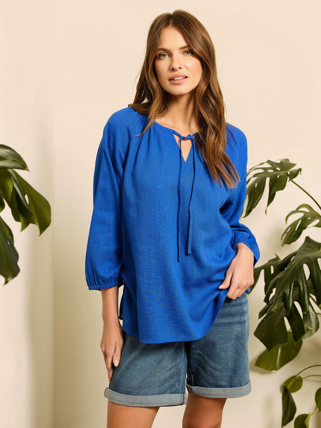  image of mco-long-sleeve-tie-neck-top