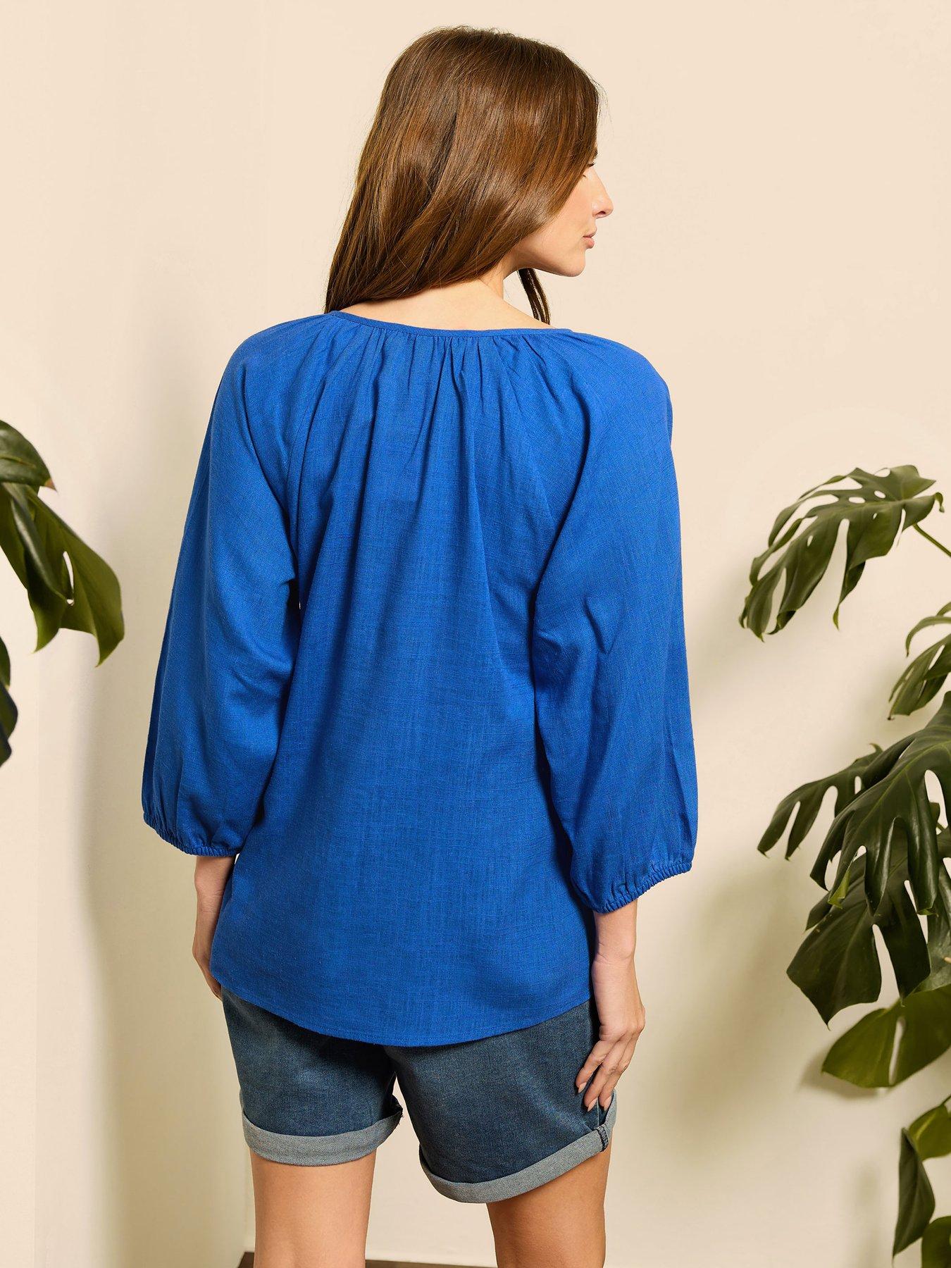 image of mco-long-sleeve-tie-neck-top