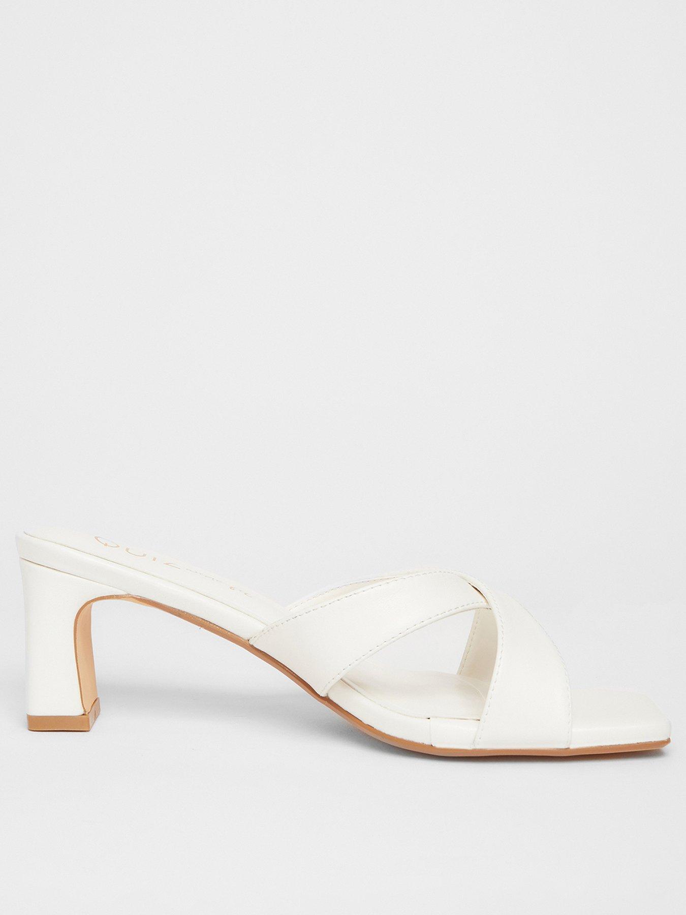  image of quiz-wide-fit-white-cross-strap-mule-heels