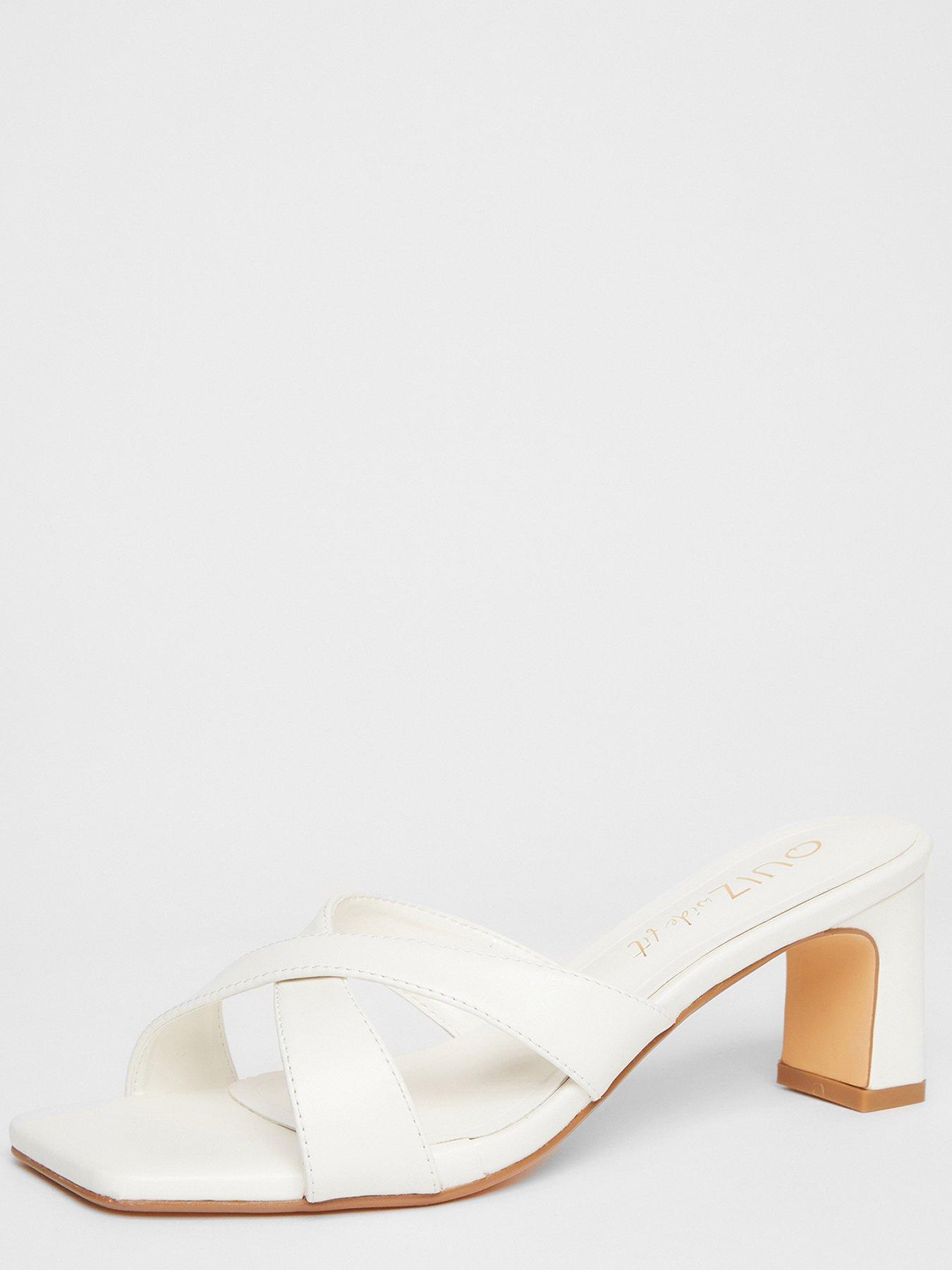  image of quiz-wide-fit-white-cross-strap-mule-heels