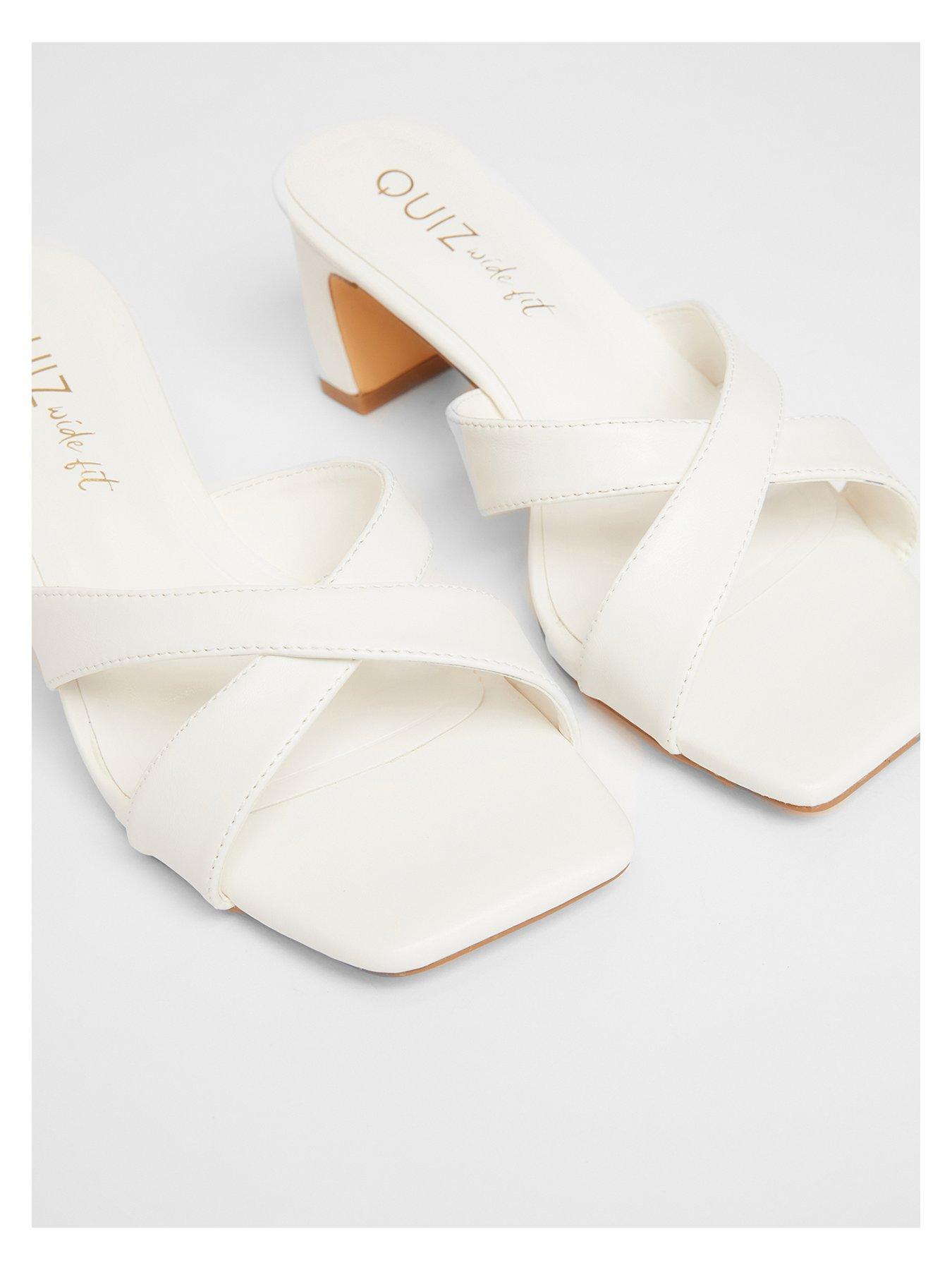 image of quiz-wide-fit-white-cross-strap-mule-heels