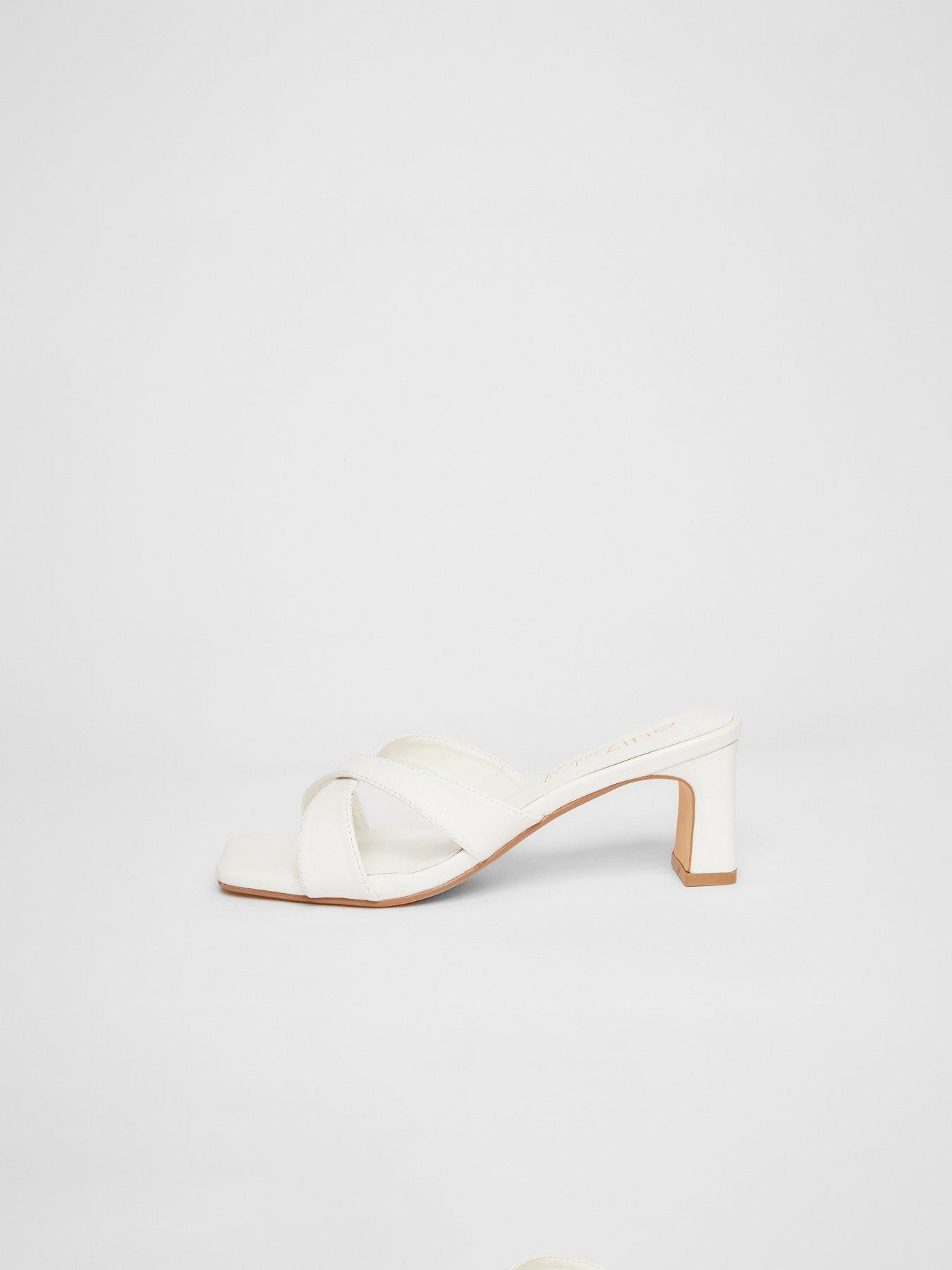  image of quiz-wide-fit-white-cross-strap-mule-heels