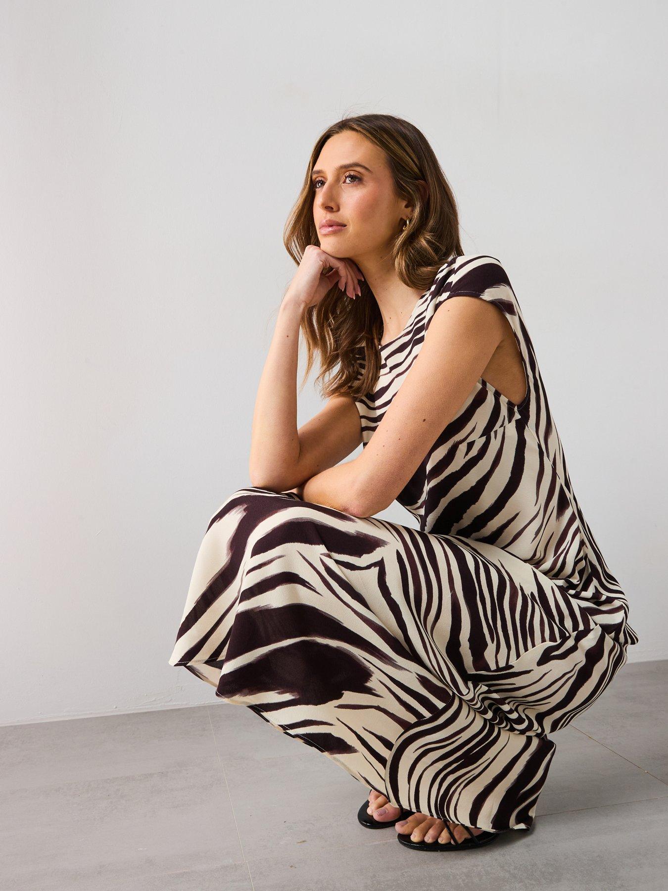  image of mango-zebra-print-midi-dress-cream