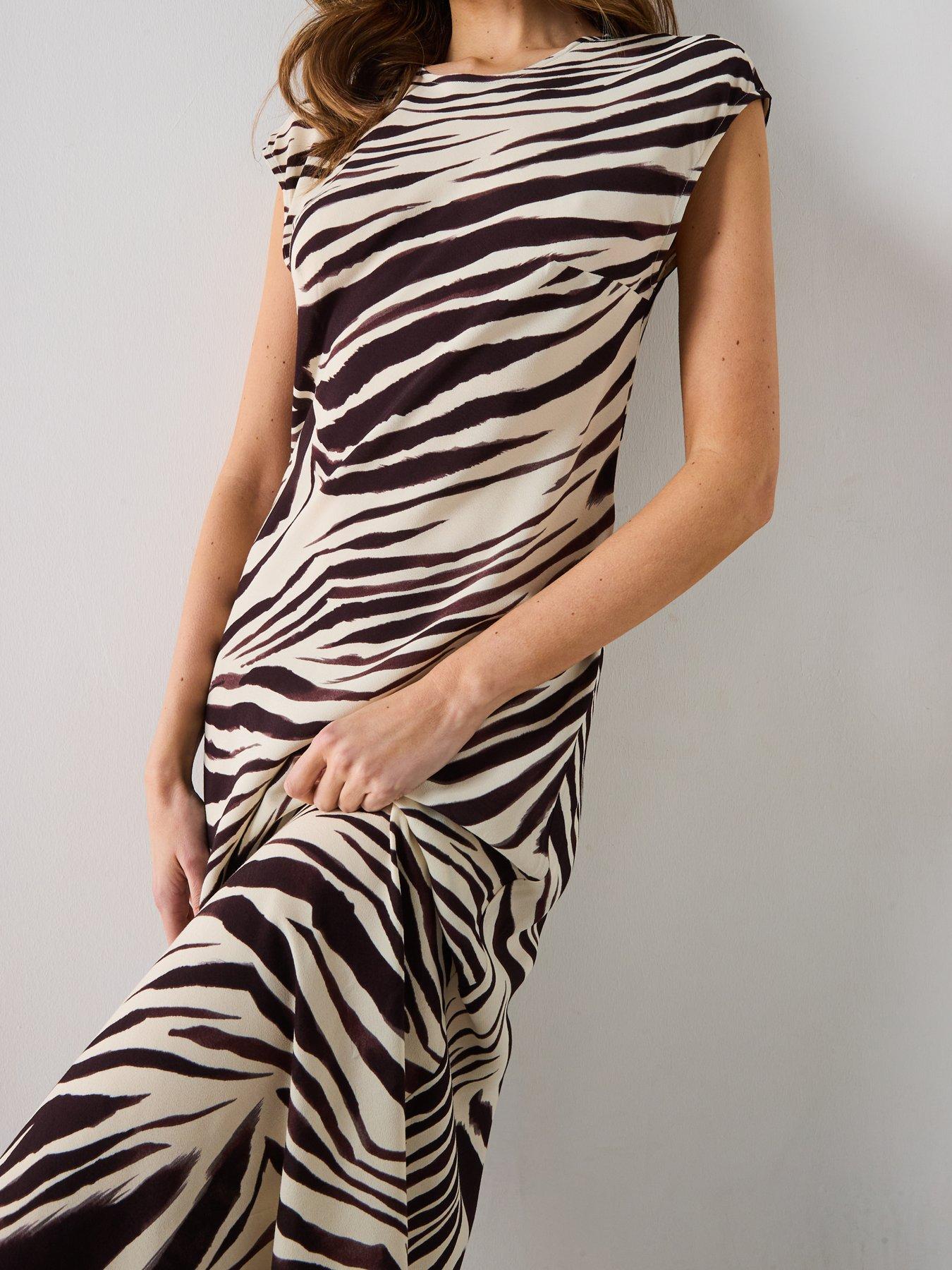  image of mango-zebra-print-midi-dress-cream