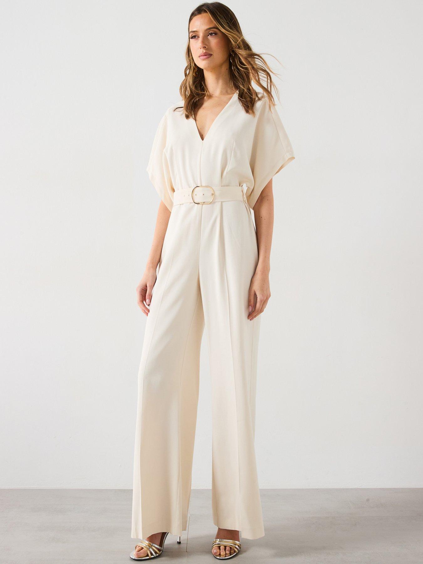  image of mango-long-jumpsuit-with-belt-and-buckle-cream