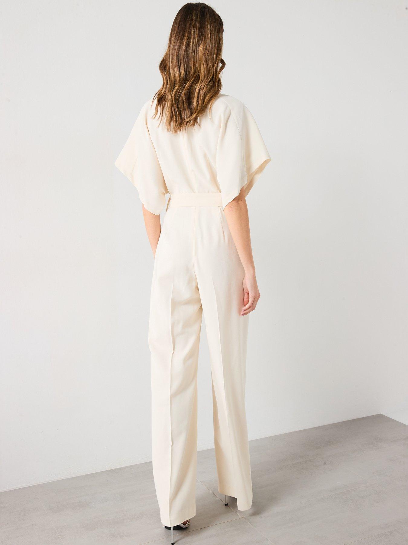  image of mango-long-jumpsuit-with-belt-and-buckle-cream