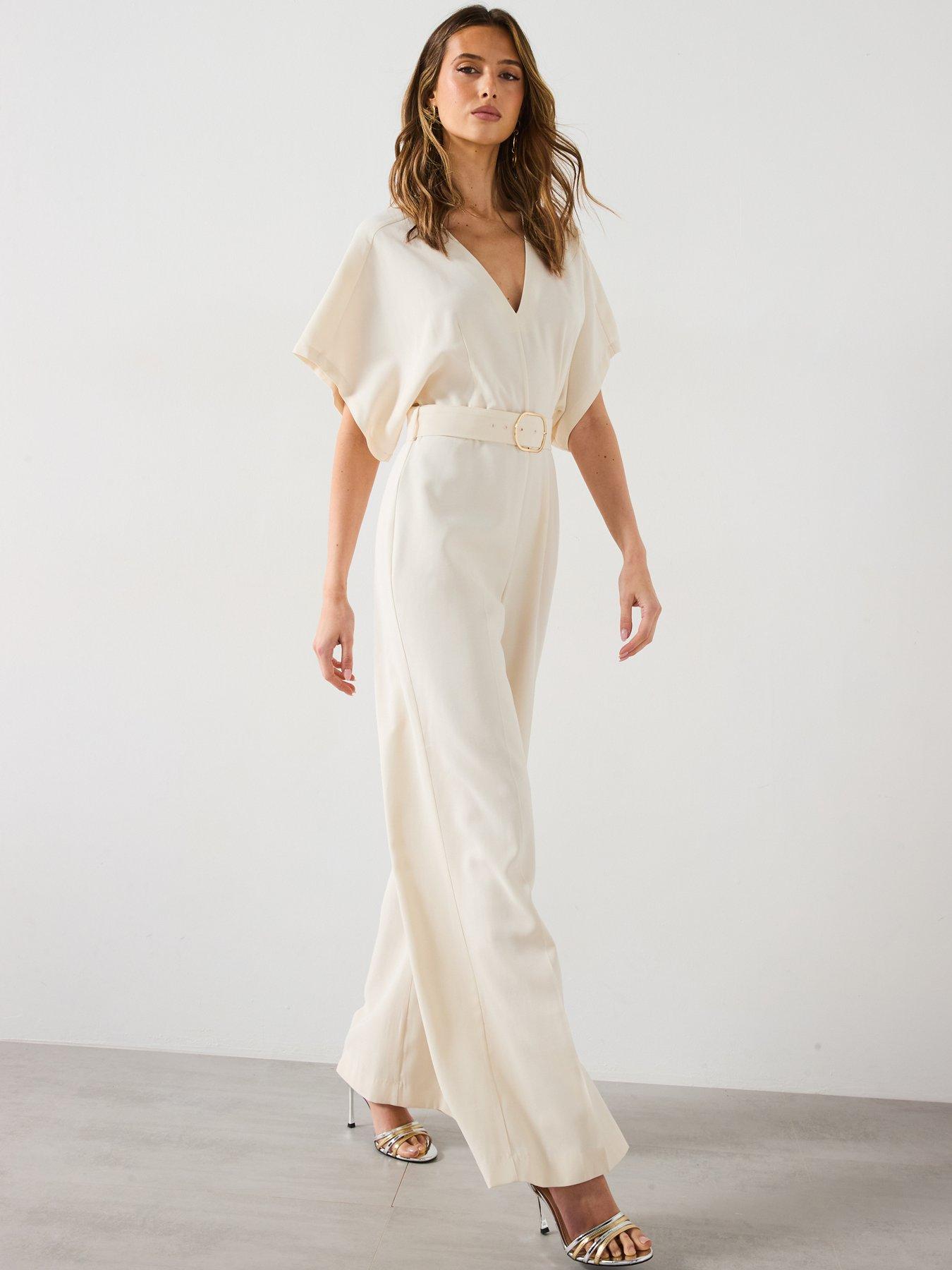  image of mango-long-jumpsuit-with-belt-and-buckle-cream