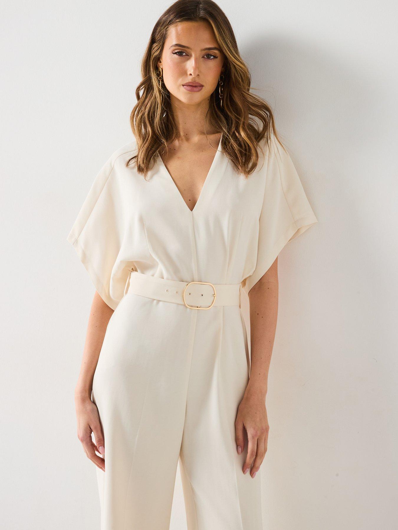  image of mango-long-jumpsuit-with-belt-and-buckle-cream