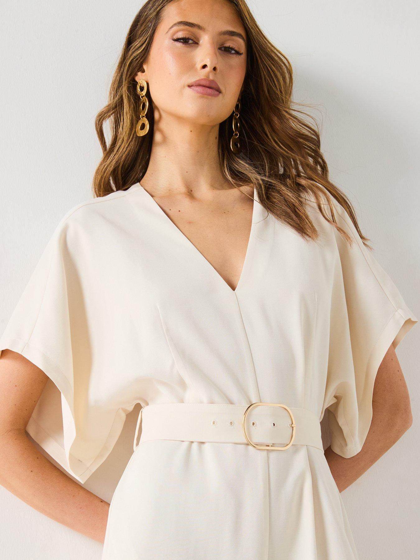  image of mango-long-jumpsuit-with-belt-and-buckle-cream
