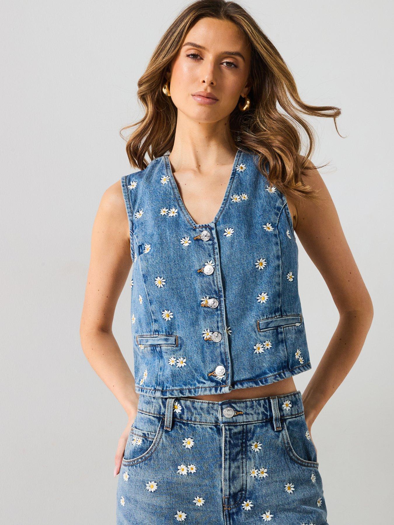 front image of mango-flower-embroidered-crop-vest-blue