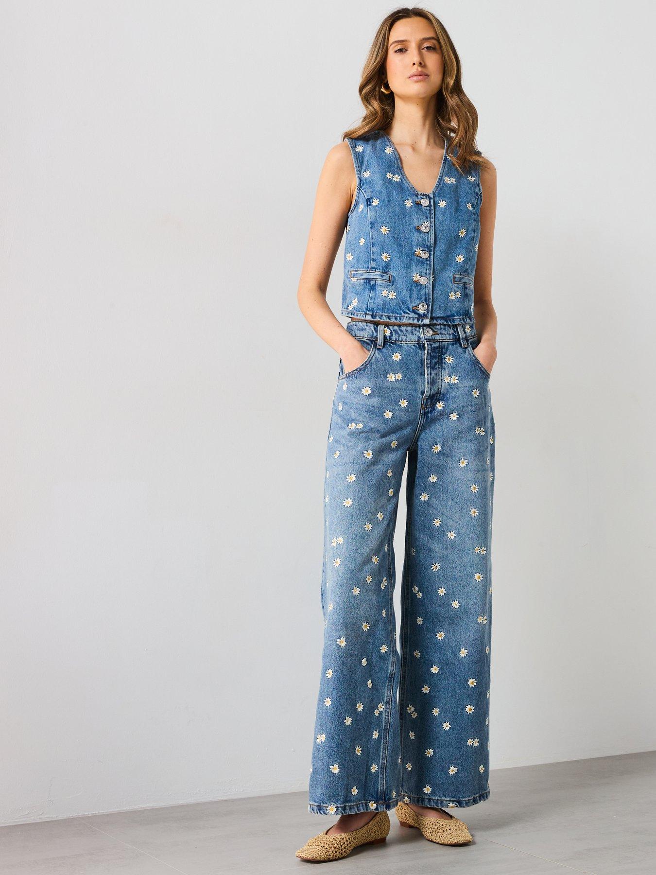  image of mango-flower-embroidered-crop-vest-blue