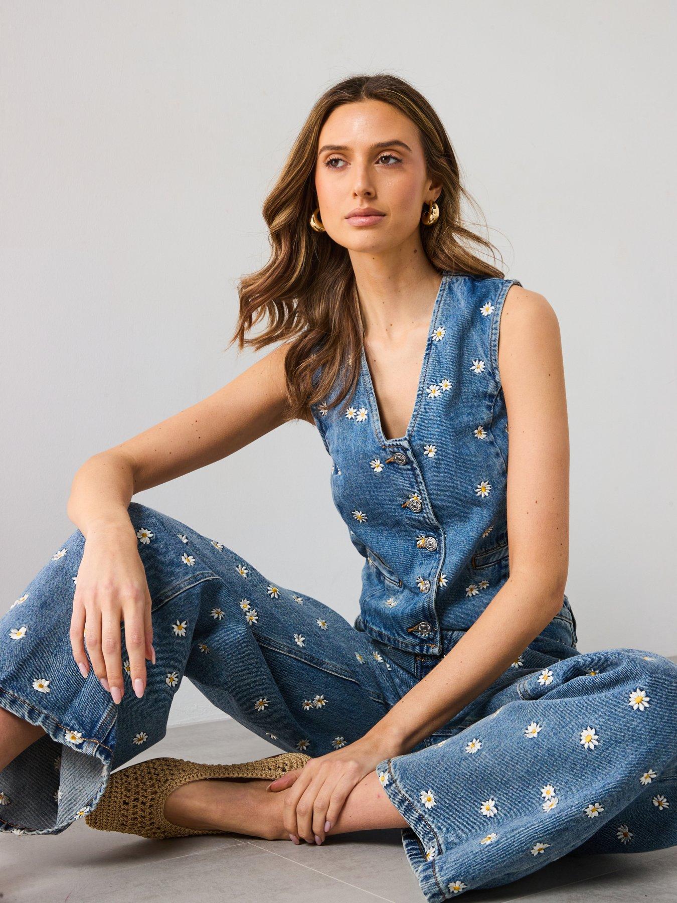  image of mango-flower-embroidered-crop-vest-blue