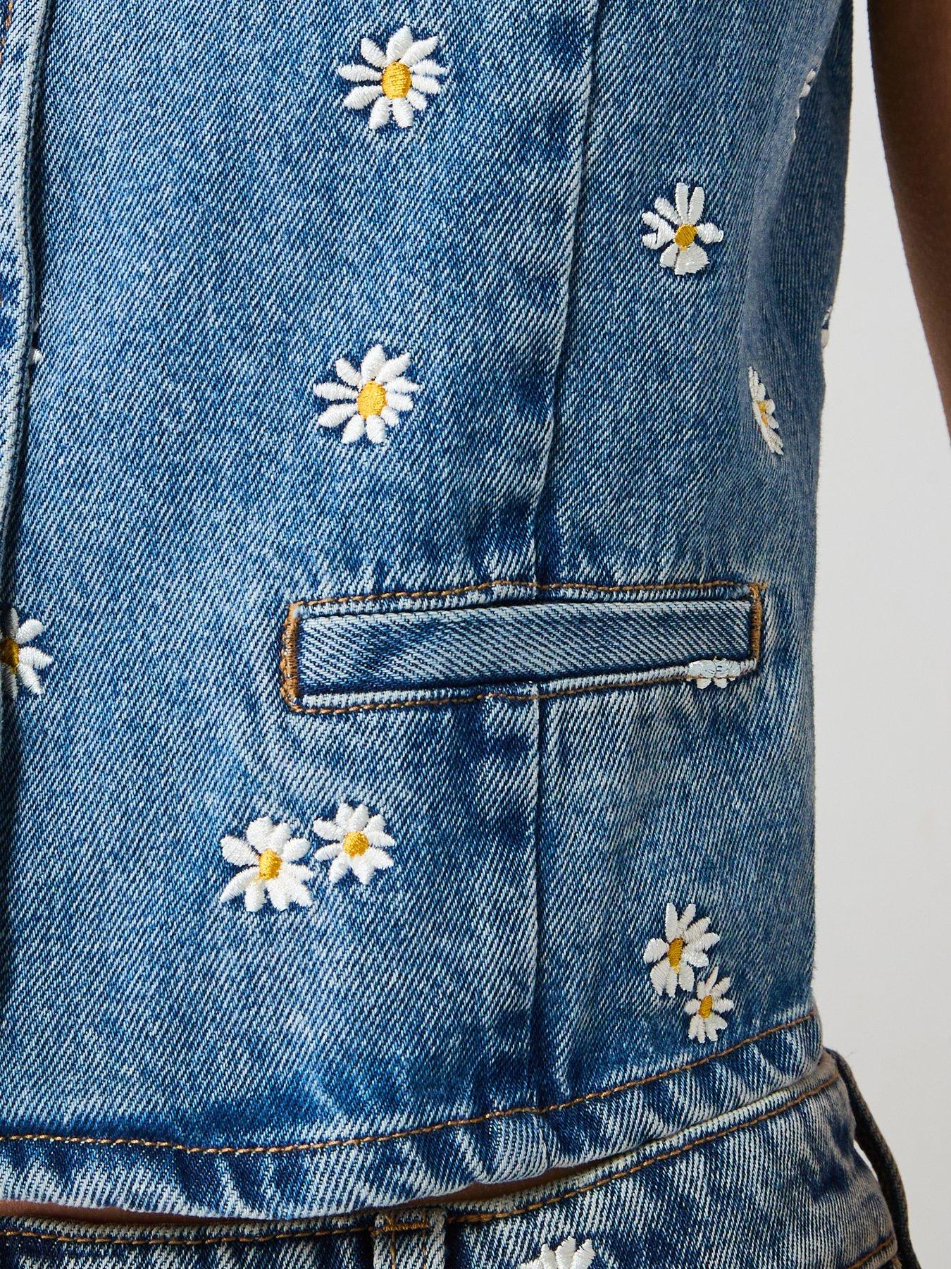  image of mango-flower-embroidered-crop-vest-blue