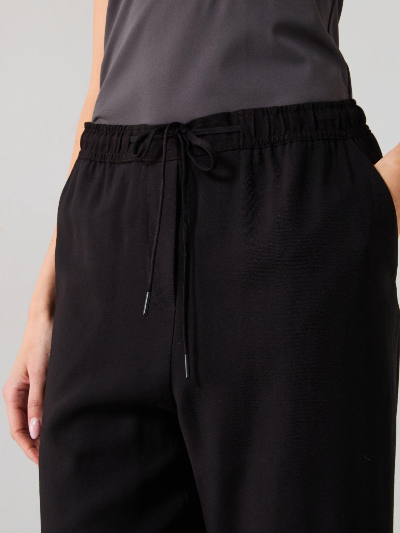  image of mango-elastic-waist-flowy-trousers