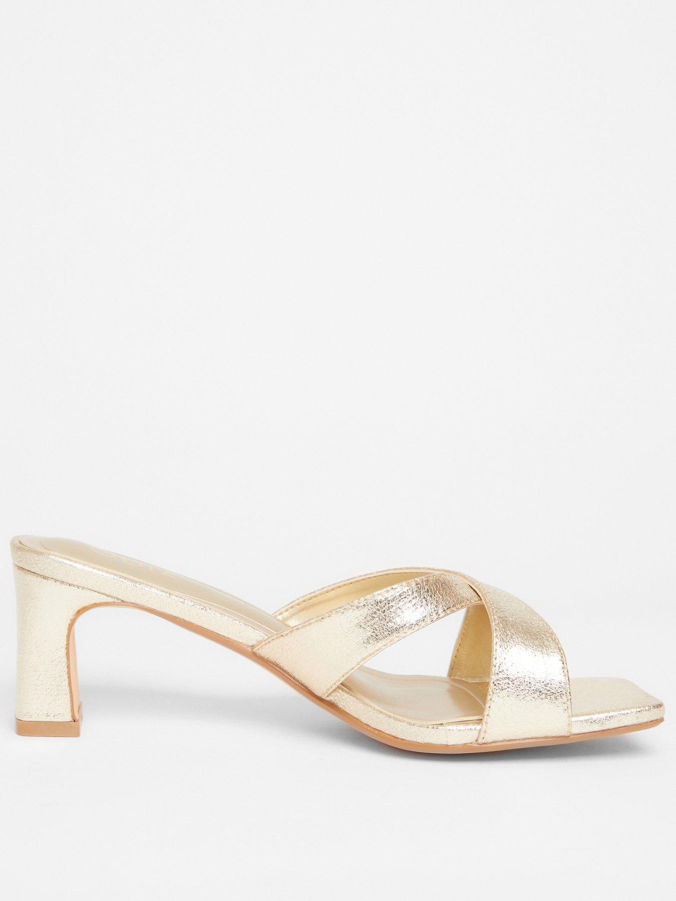  image of quiz-wide-fit-gold-cross-strap-mule-heels