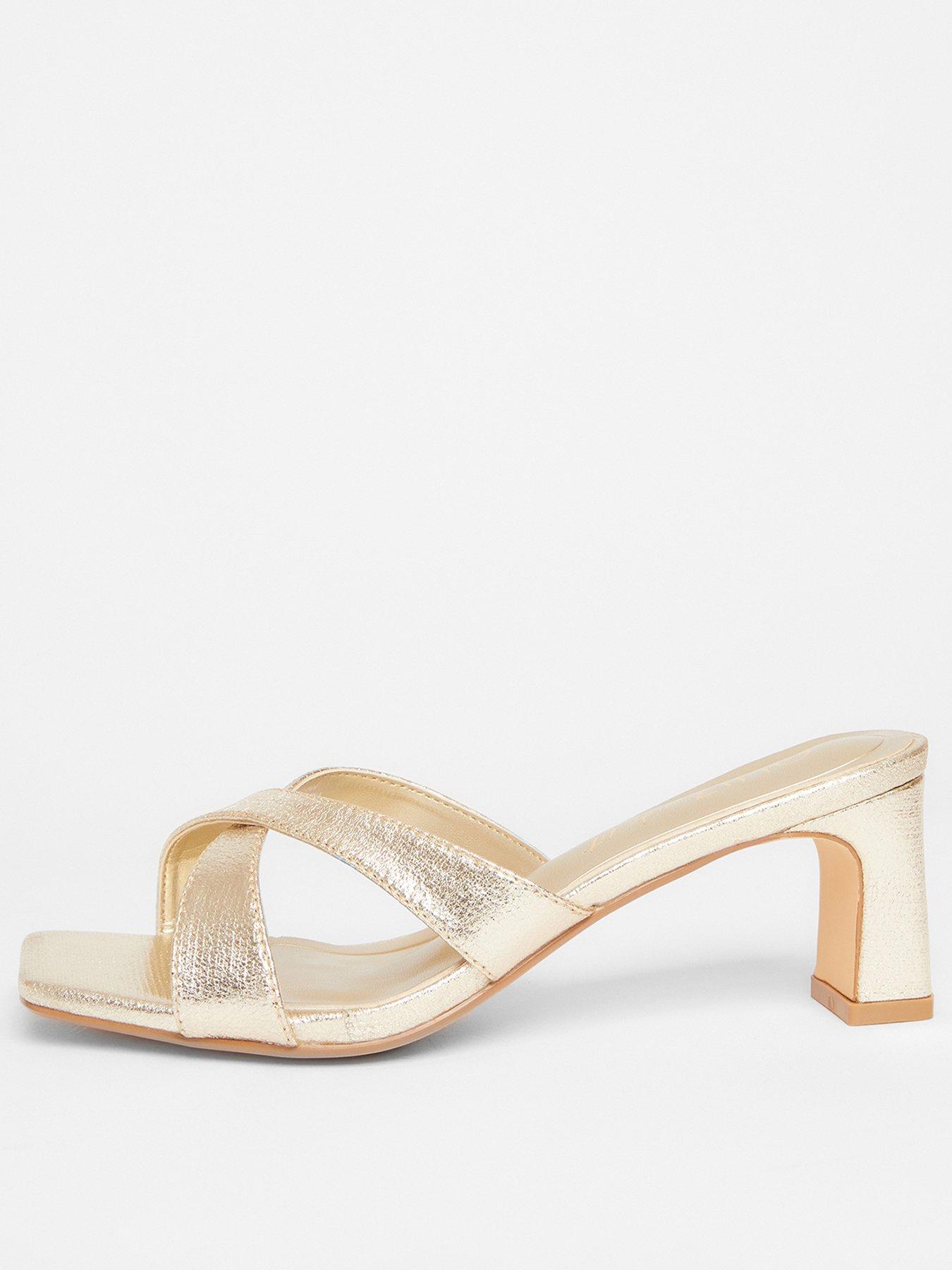  image of quiz-wide-fit-gold-cross-strap-mule-heels