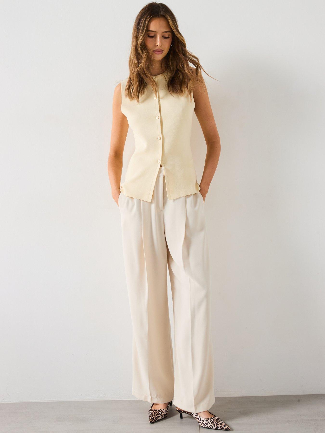  image of mango-fine-knit-waistcoat-with-buttons-cream