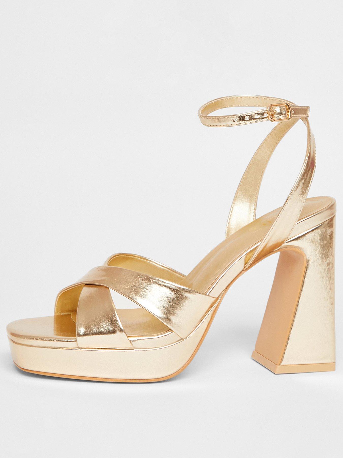  image of quiz-gold-cross-strap-platform-heels