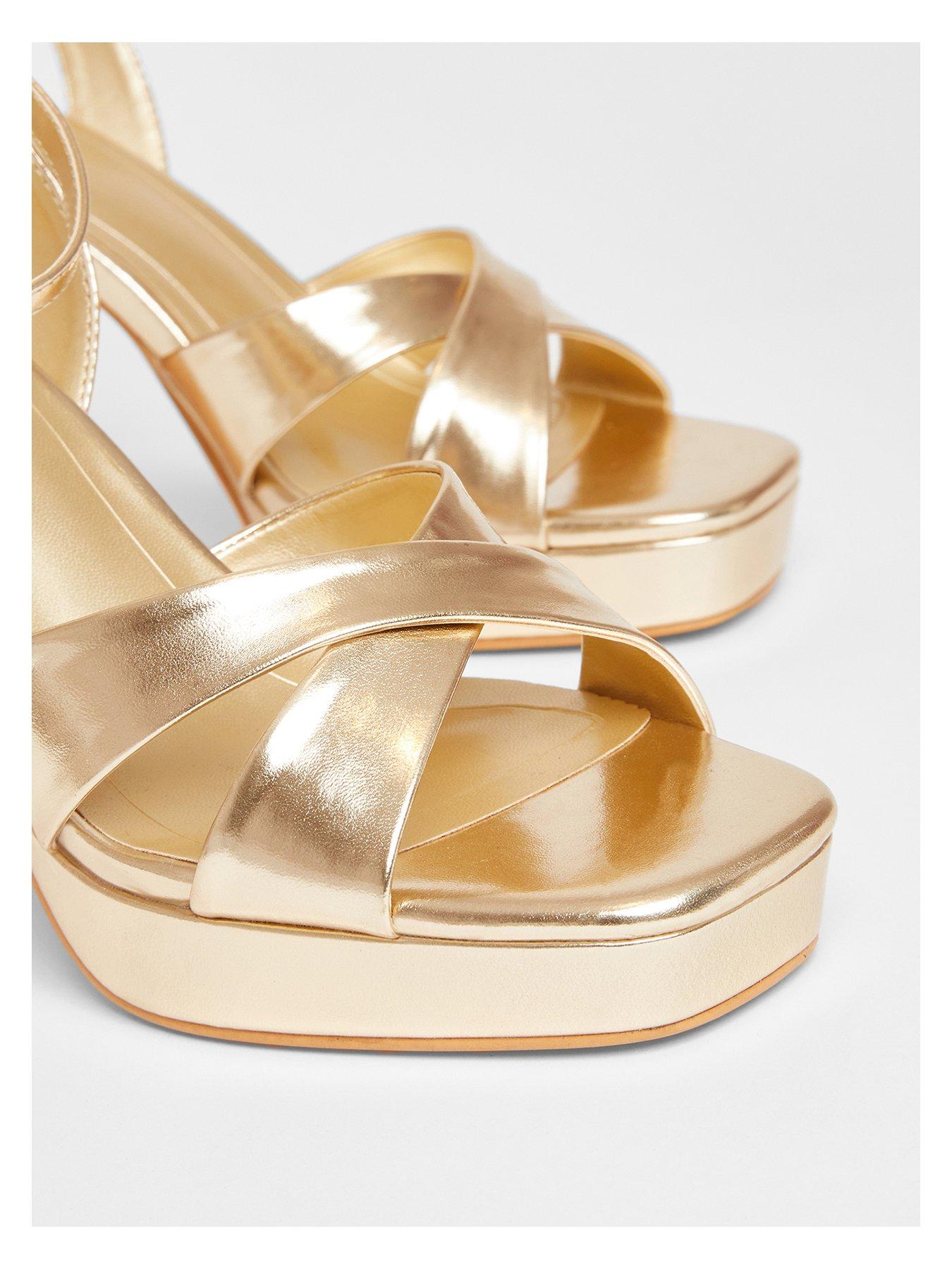  image of quiz-gold-cross-strap-platform-heels