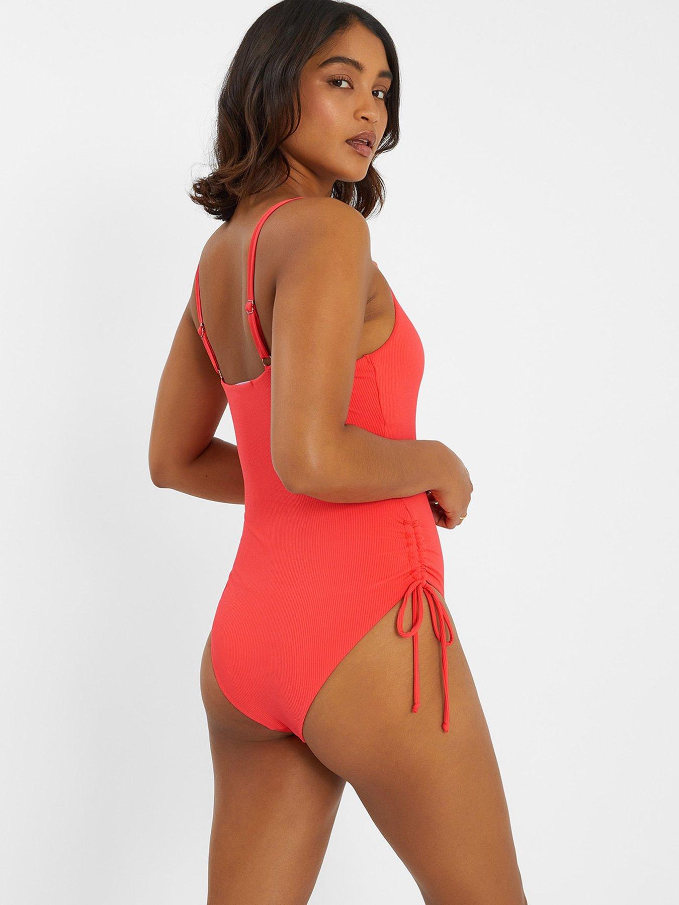  image of accessorize-coral-rib-ruched-side-swimsuit-coral