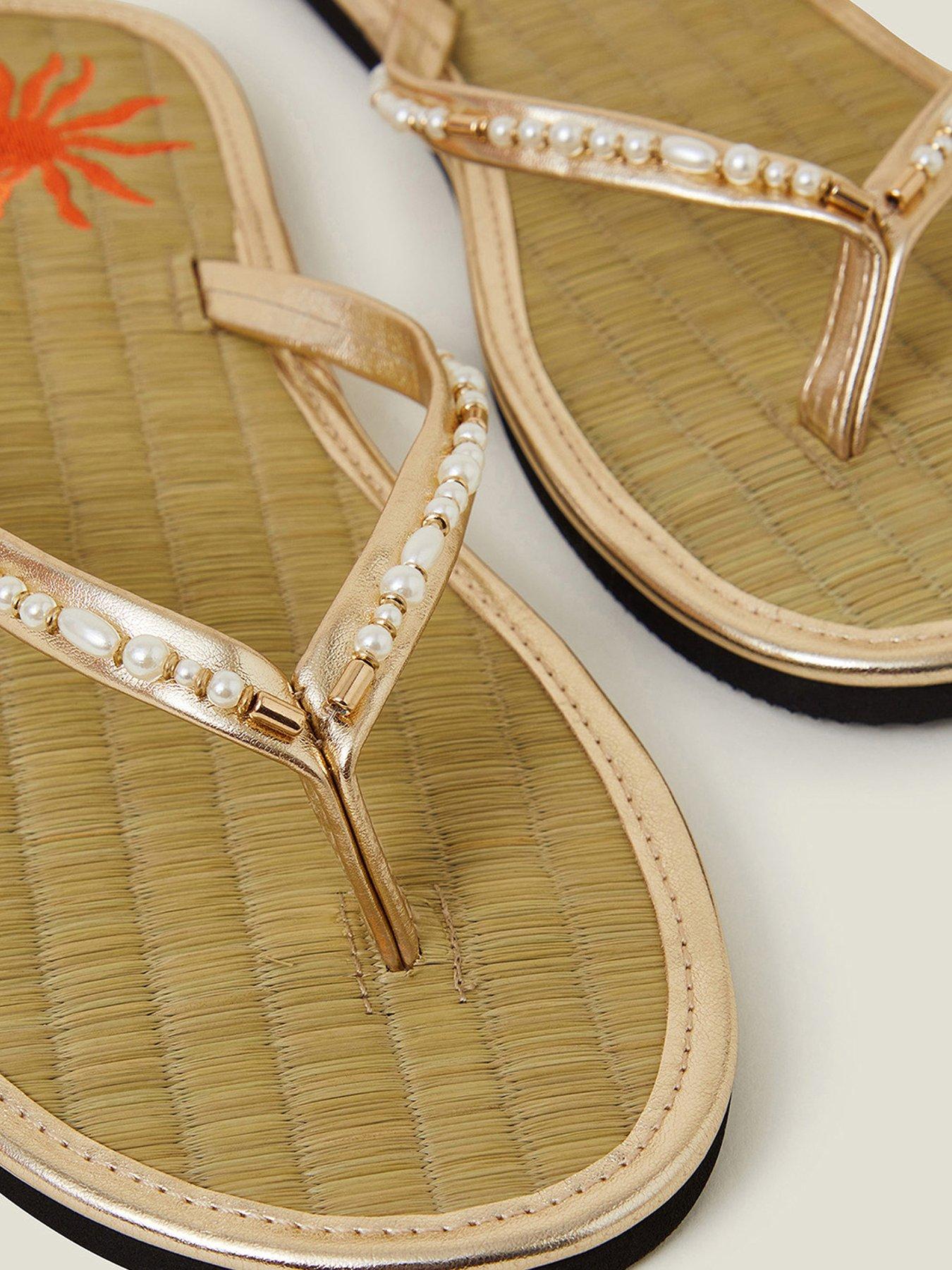  image of accessorize-sun-embroidered-seagrass-flip-flops-gold