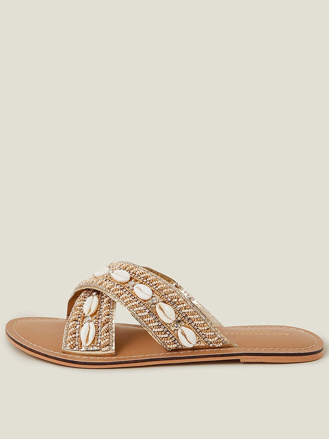 undefined Shell Cross Strap Sandals - Gold