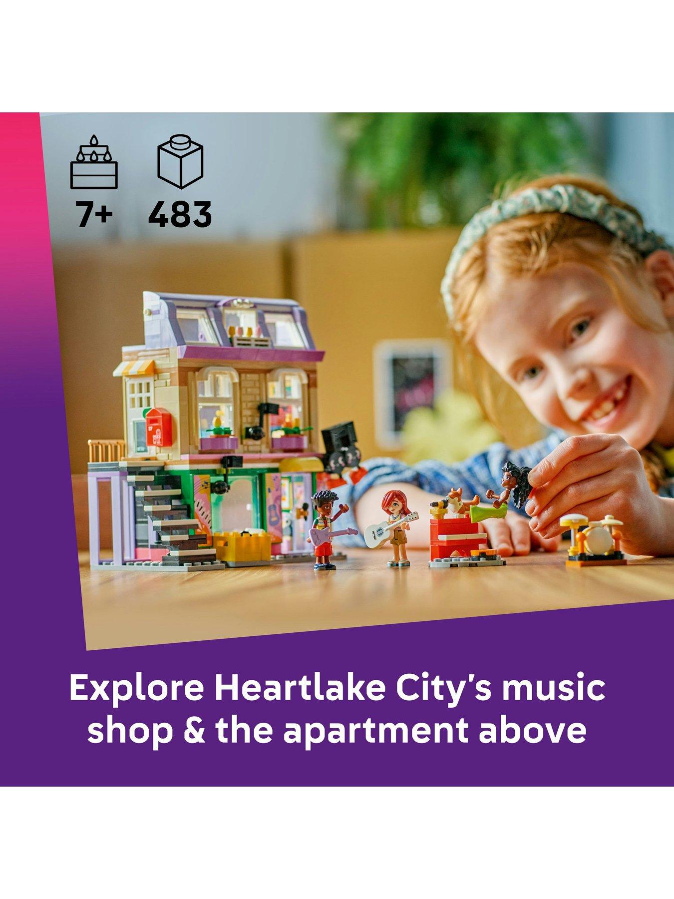 stillFront image of lego-friends-music-shop-amp-apartment-building-set-pretend-play-toy-42653