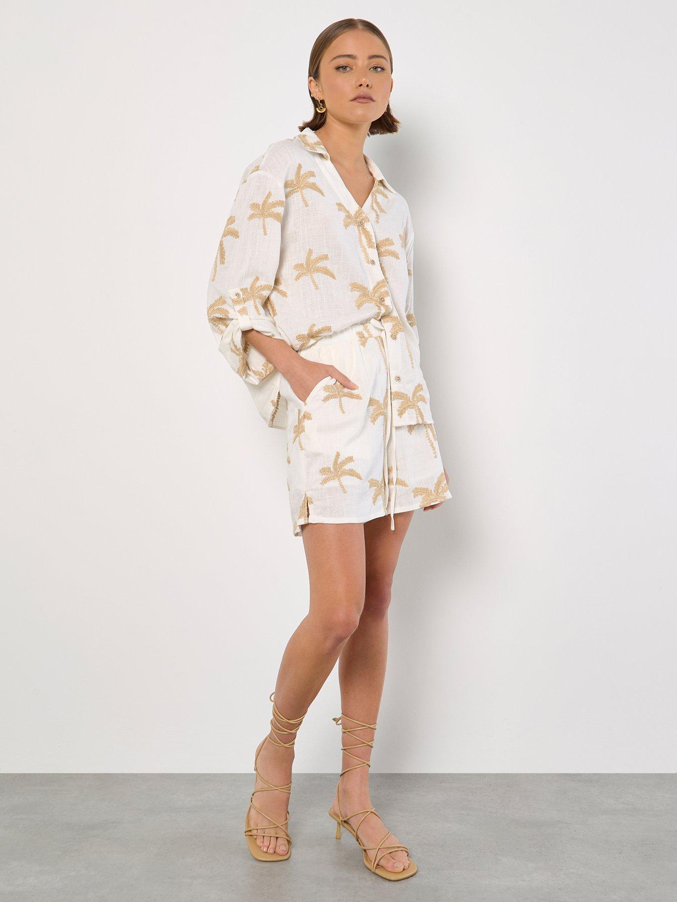  image of apricot-embroidered-palm-linen-mix-shirt