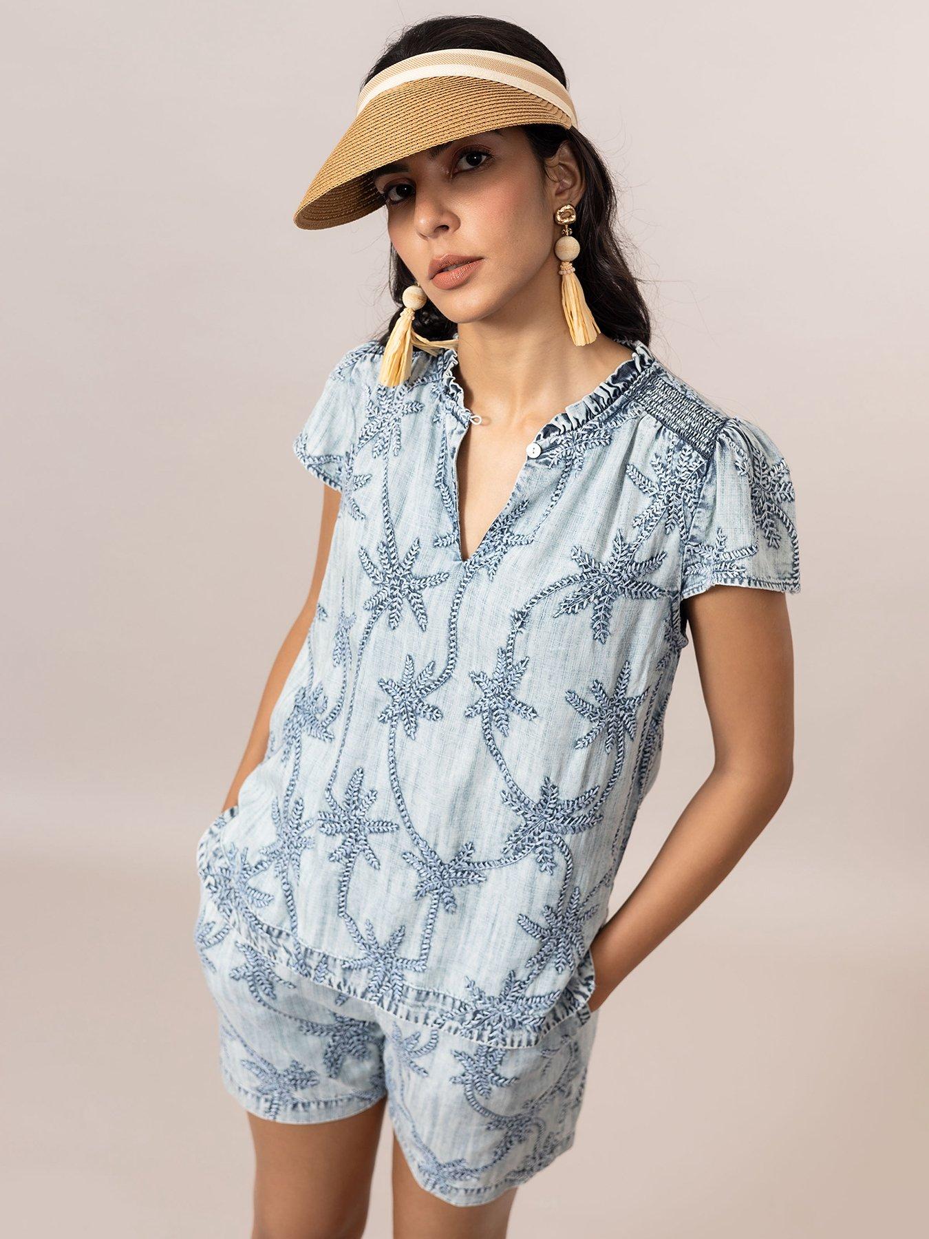 front image of emily-lovelock-claire-palm-print-denim-top