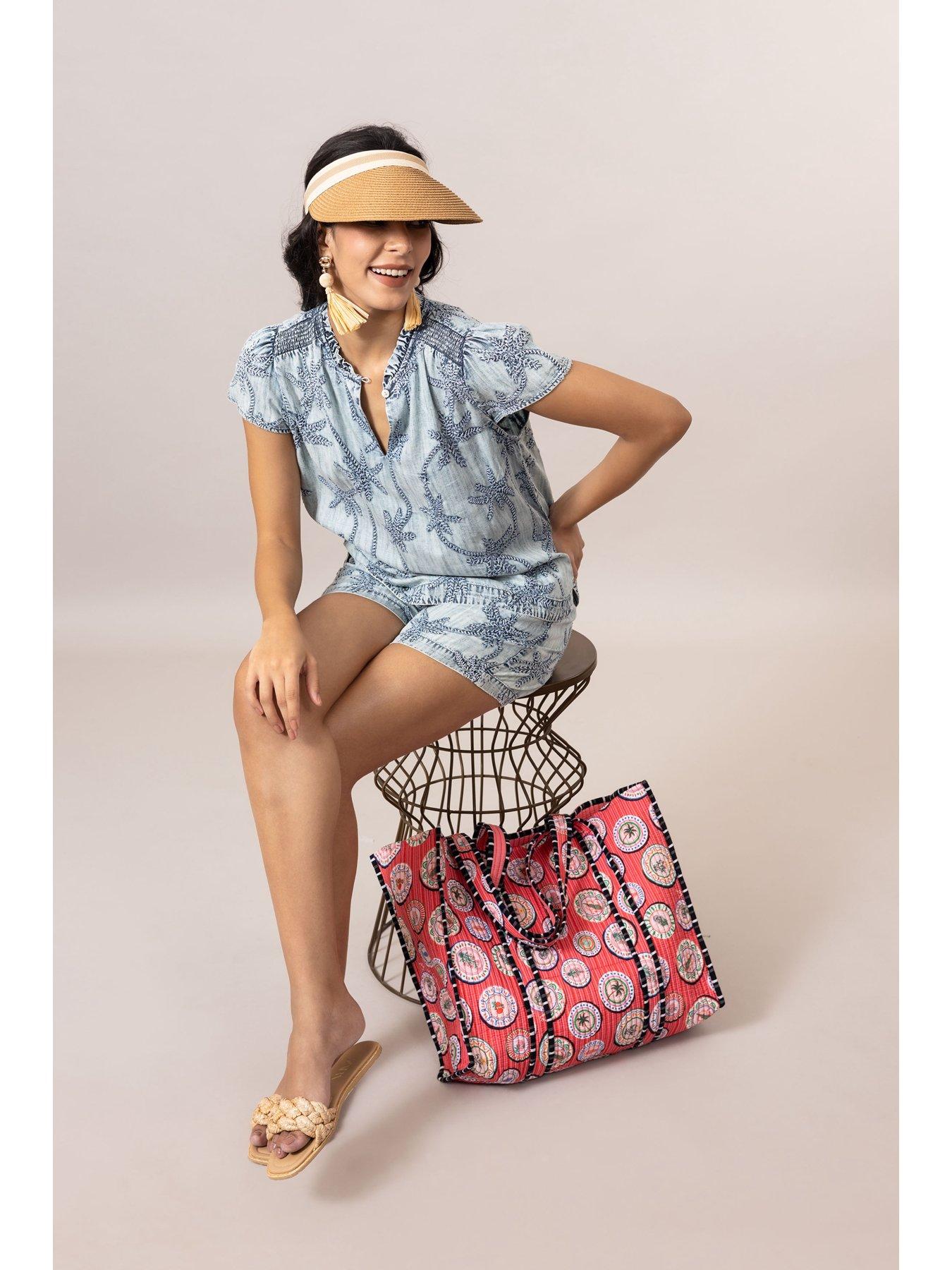 back image of emily-lovelock-claire-palm-print-denim-top