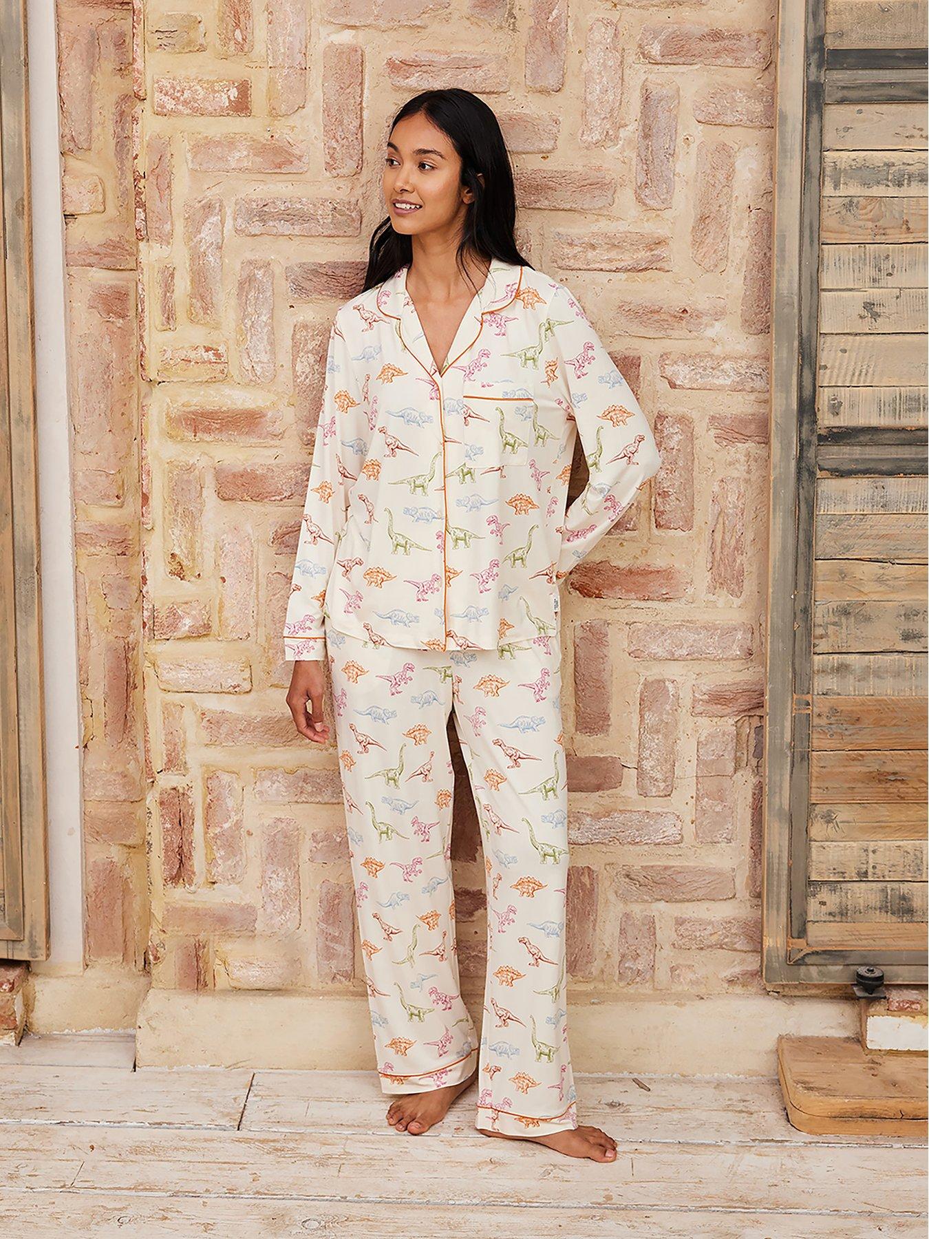 Image 1 of 4 of CHELSEA PEERS Dinosaur Print Long Pyjama Set