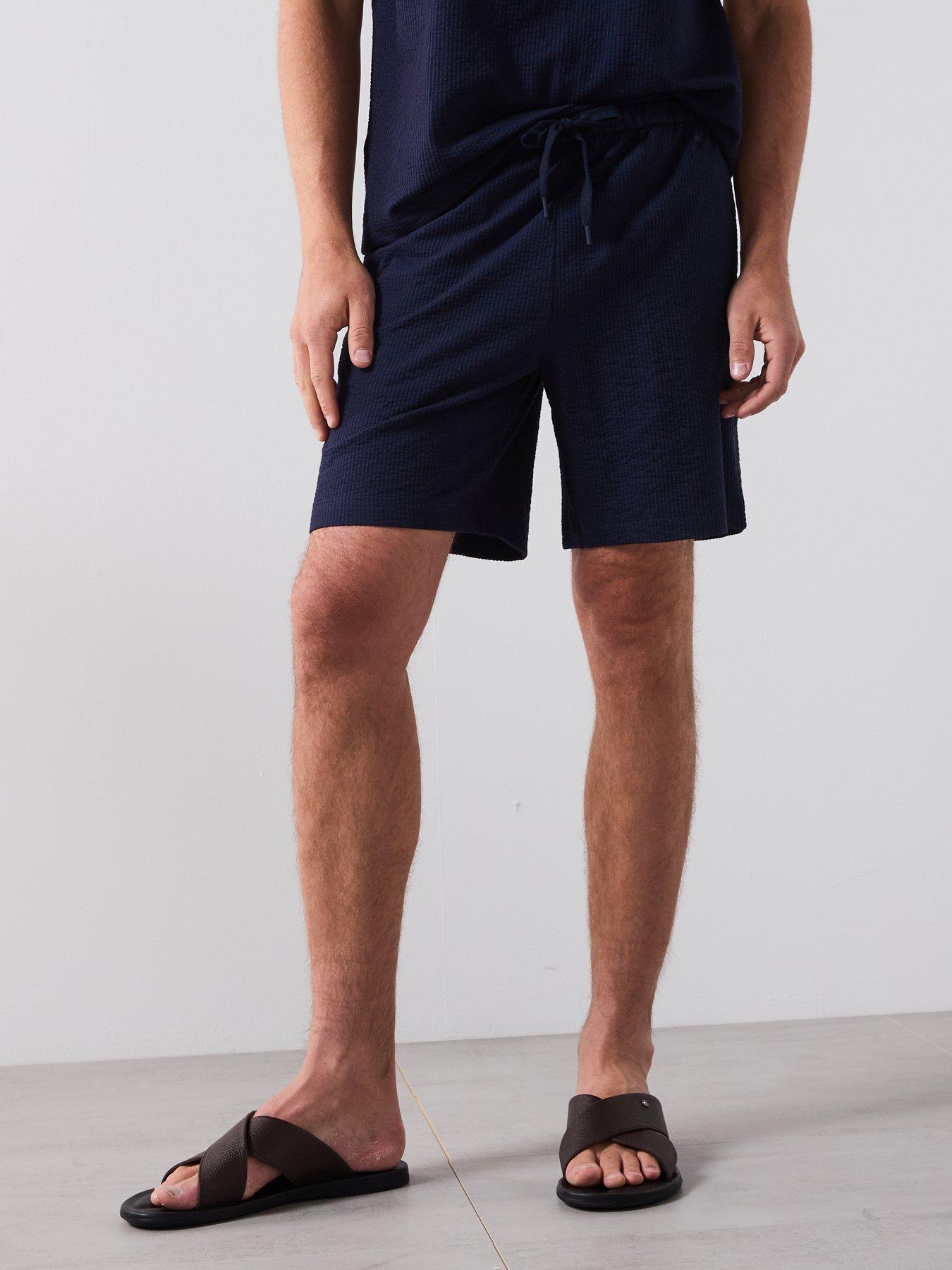 front image of mango-seers-smart-textured-shorts-navy