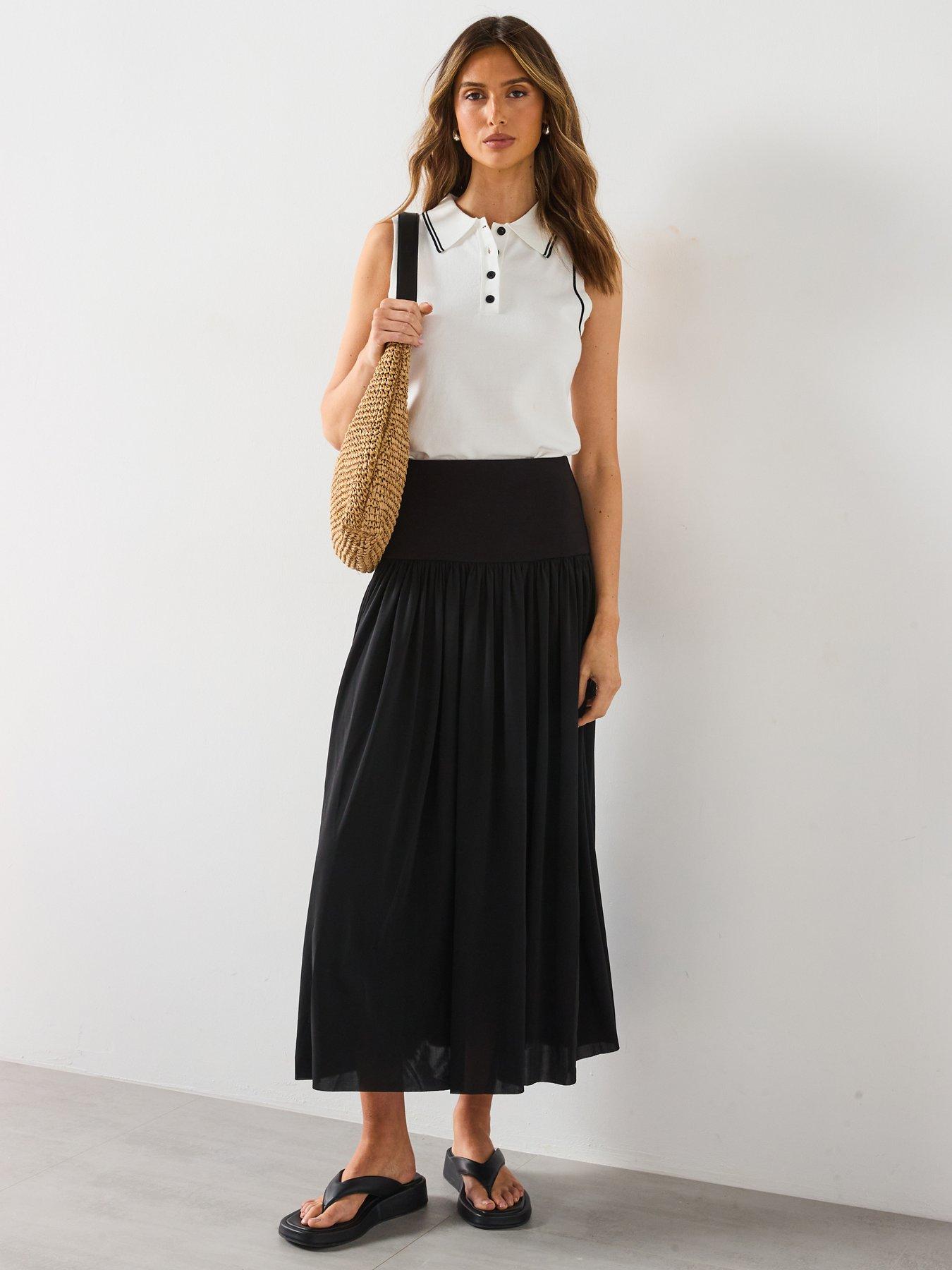  image of mango-polo-neck-knitted-top-with-contrasting-trims-cream