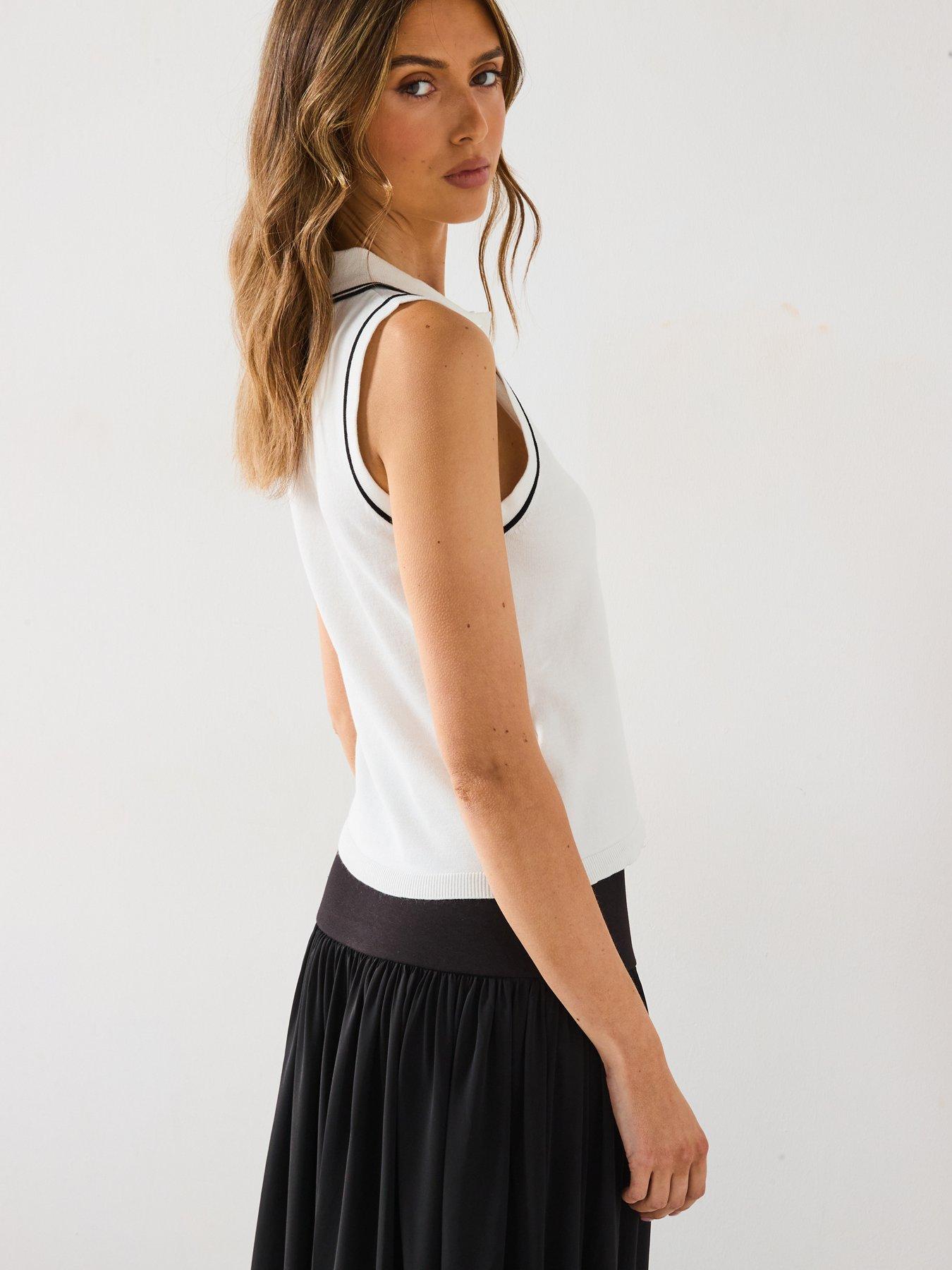  image of mango-polo-neck-knitted-top-with-contrasting-trims-cream