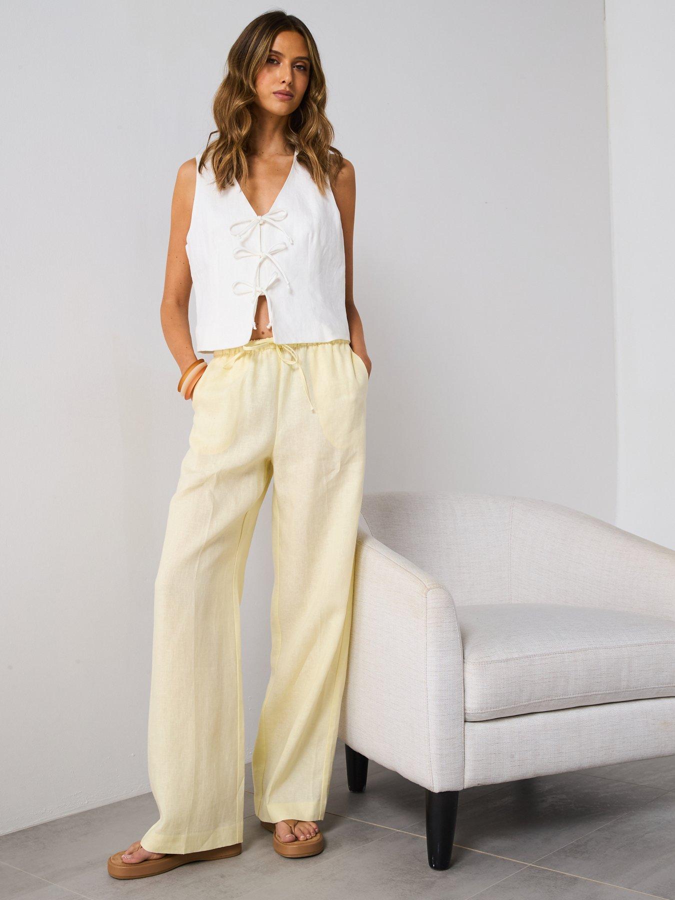  image of mango-straight-linen-pants-with-bow-yellow