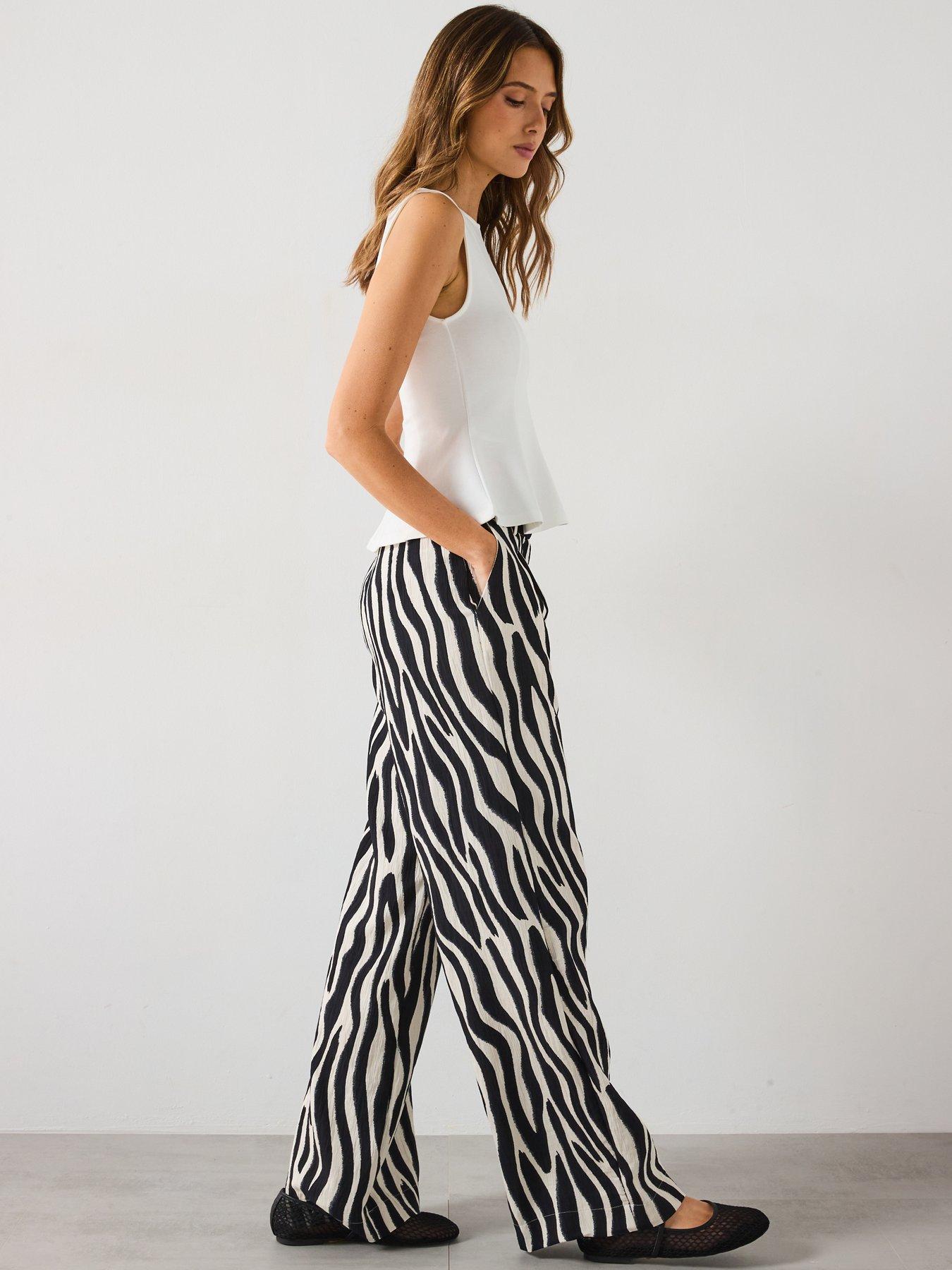  image of mango-zebra-print-straight-fit-trousers-black